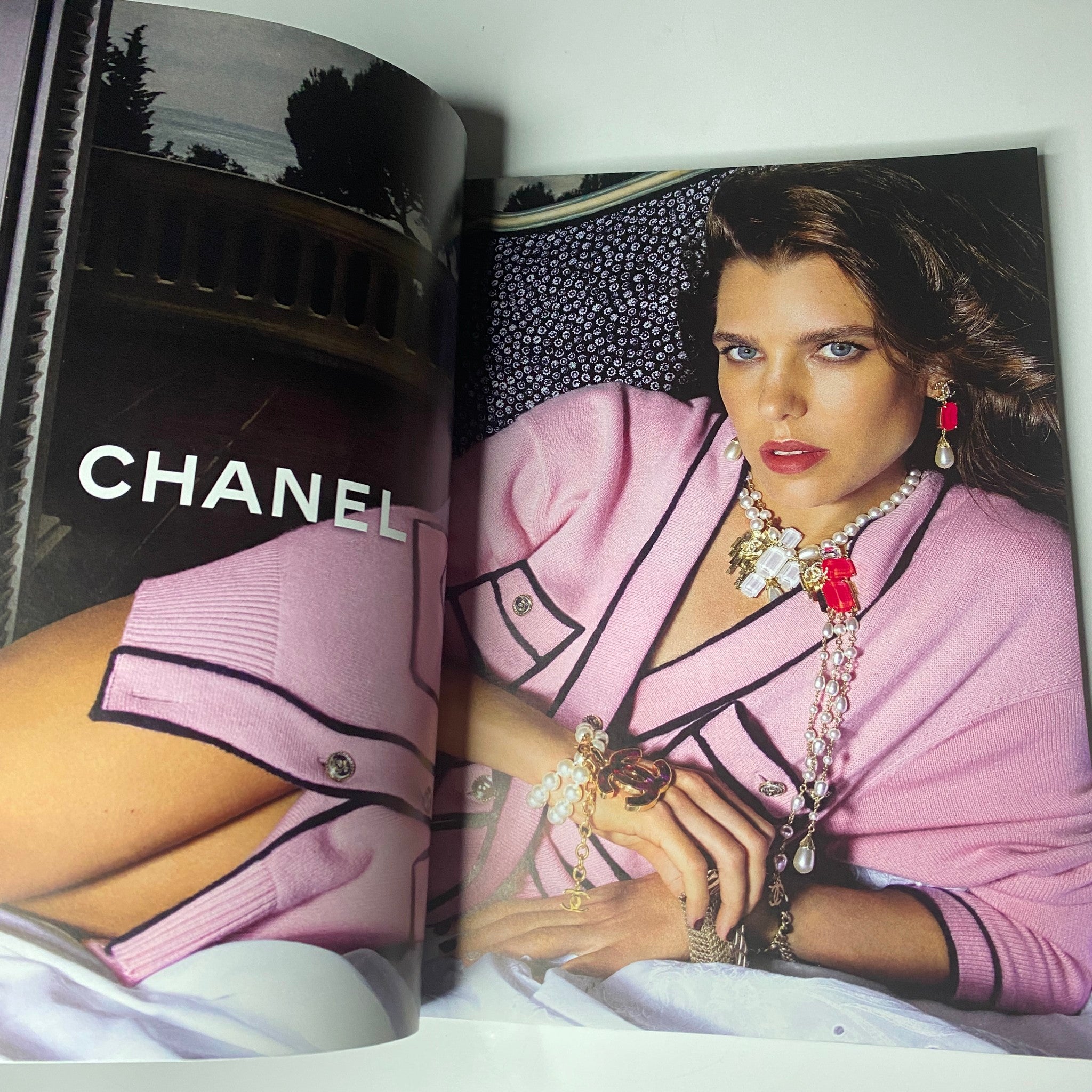 Fashion editorial spread from W Magazine 2021 Volume 1 displaying a model in Chanel attire.