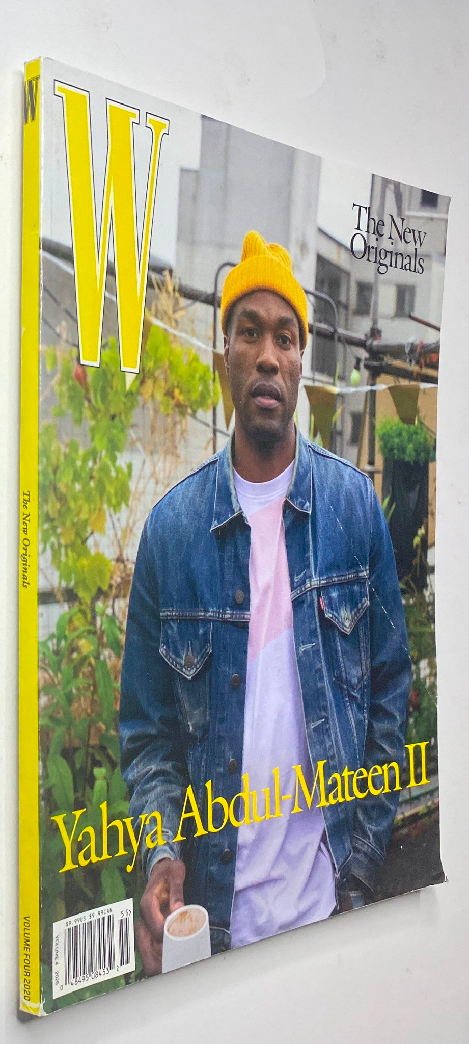 W Magazine 2020 Vol 4 Yahya Abdul-Mateen II Cover capturing Yahya Abdul-Mateen II in casual style with a denim jacket and yellow hat, highlighting contemporary trends.
