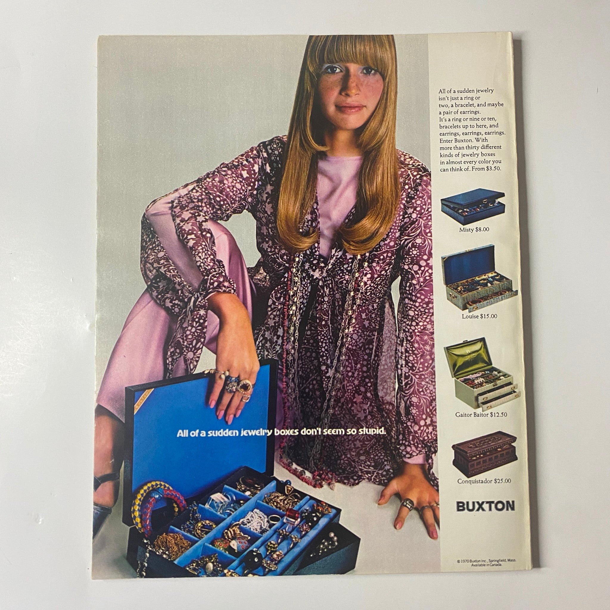 A vintage advertisement from Seventeen Magazine February 1970 featuring a young woman with long hair, promoting jewelry boxes by Buxton.