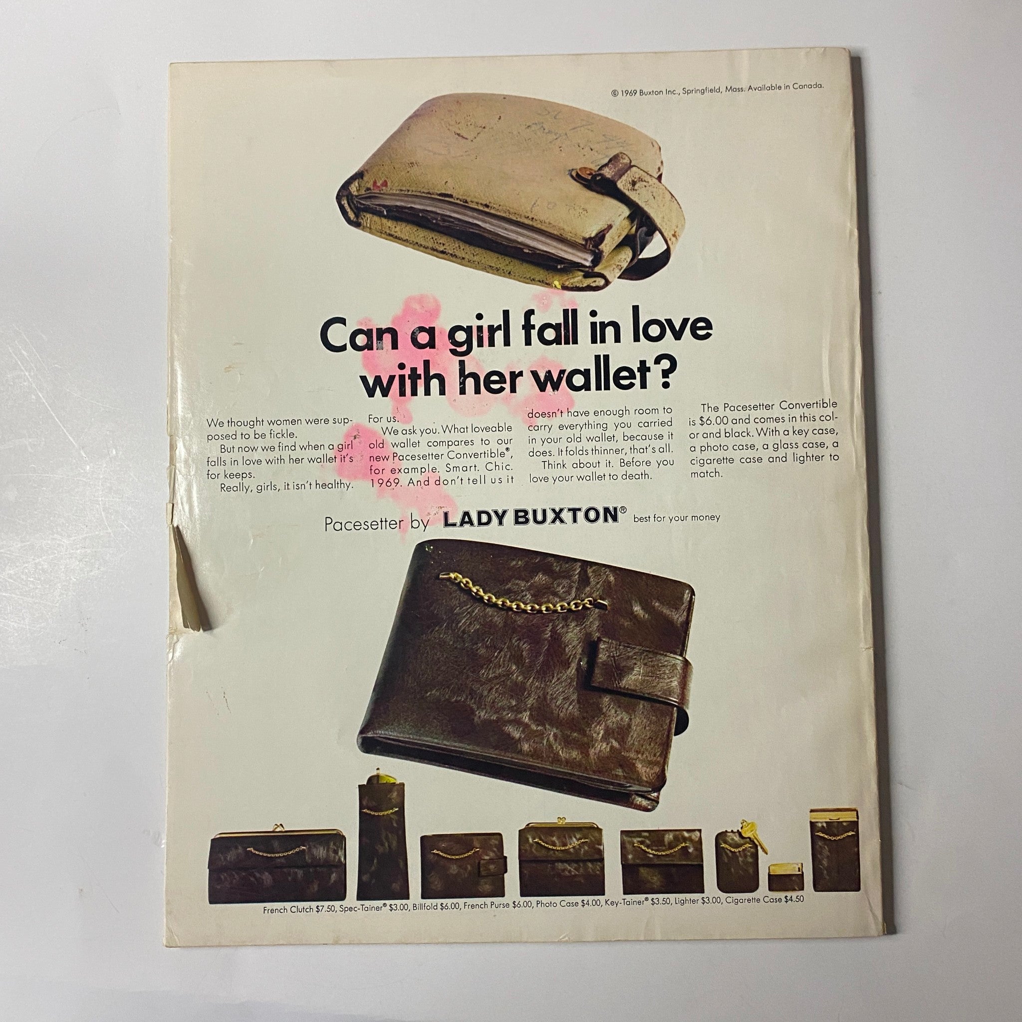 Back cover of Seventeen Magazine December 1969 showcasing a Lady Buxton advertisement with the tagline 'Can a girl fall in love with her wallet?' highlighting a leather wallet design.