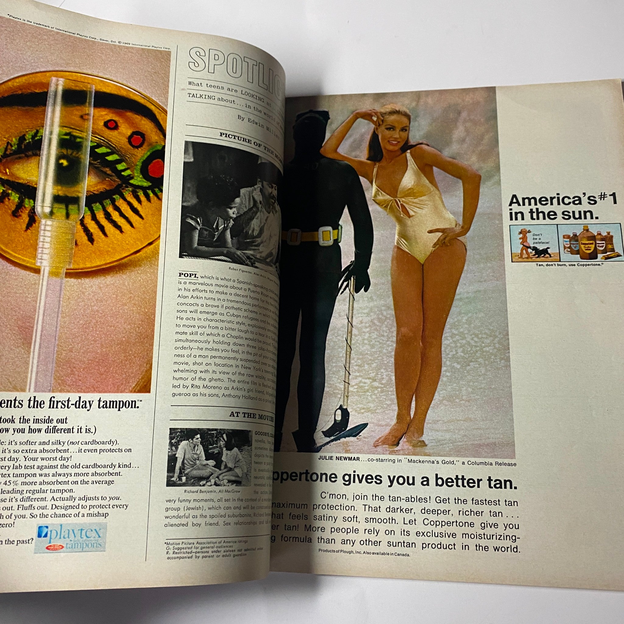 Seventeen Magazine June 1969 featuring a glossy advertisement of a model in a stylish swimsuit promoting suntan products, showcasing summer fashion and beauty trends of the era.