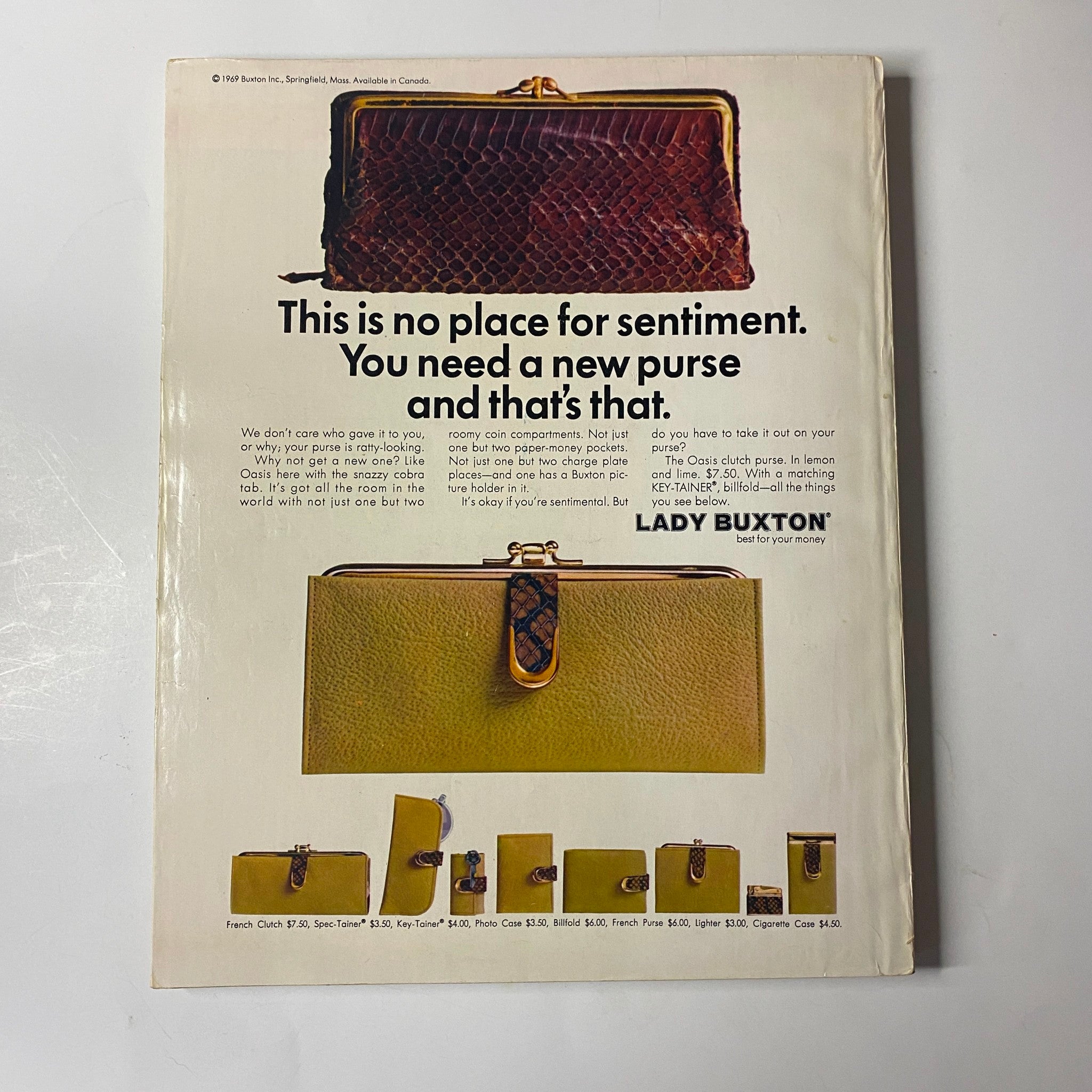 The back cover of Seventeen Magazine August 1969 Fashion Issue featuring an advertisement for Lady Buxton handbags, emphasizing fashion accessories of the era.