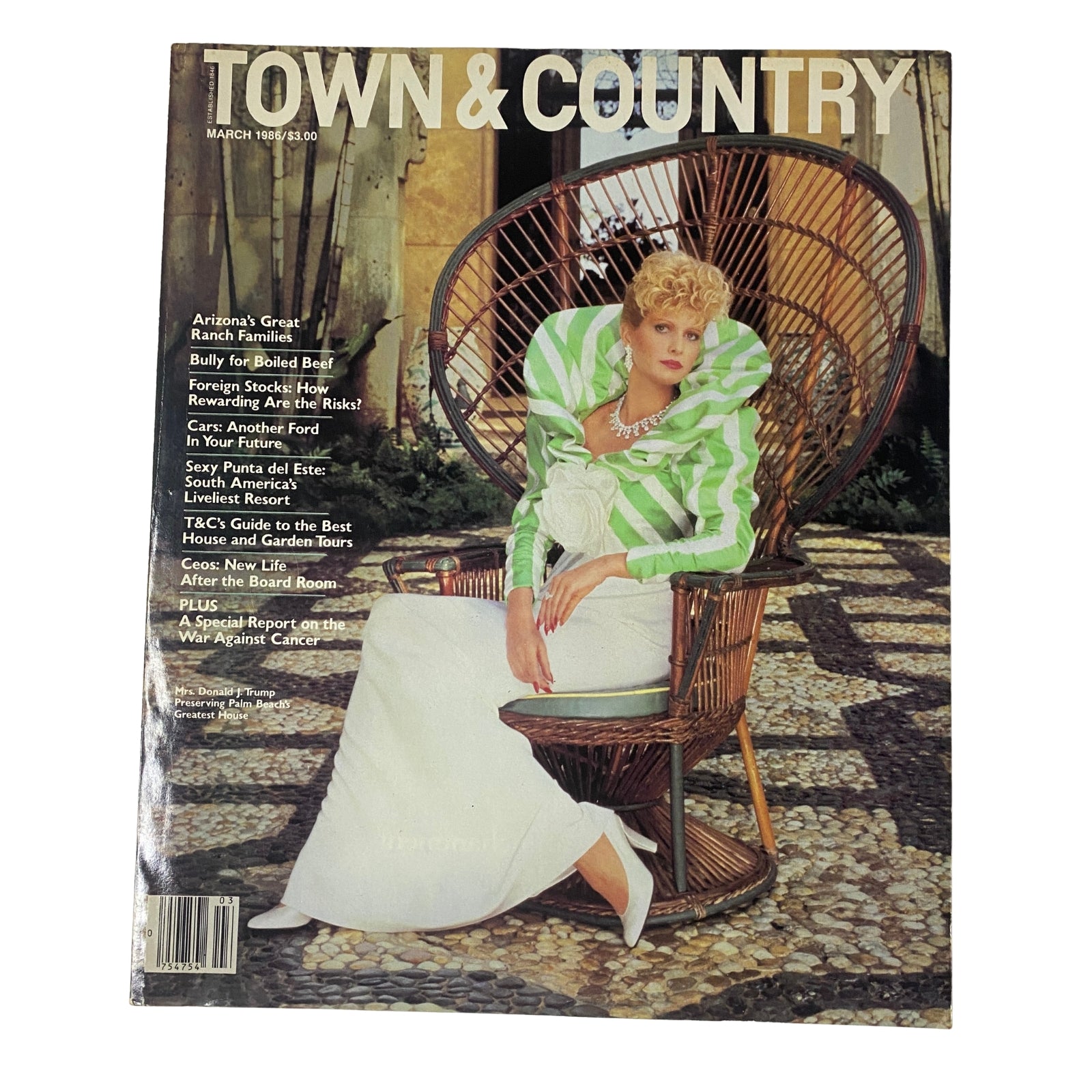 Cover of Town & Country Magazine, March 1986, featuring a glamorous model in a green and white striped outfit, showcasing 1980s fashion trends. This vintage magazine is notable for its portrayal of high society and luxury living.