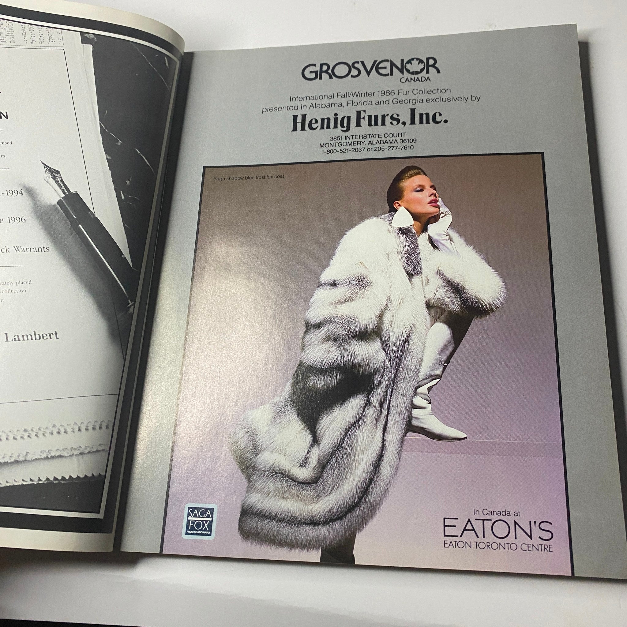 Advertisement from Town & Country Magazine November 1986 featuring elegant furs from Henig Furs Inc., displayed by a model in a luxurious fur coat.