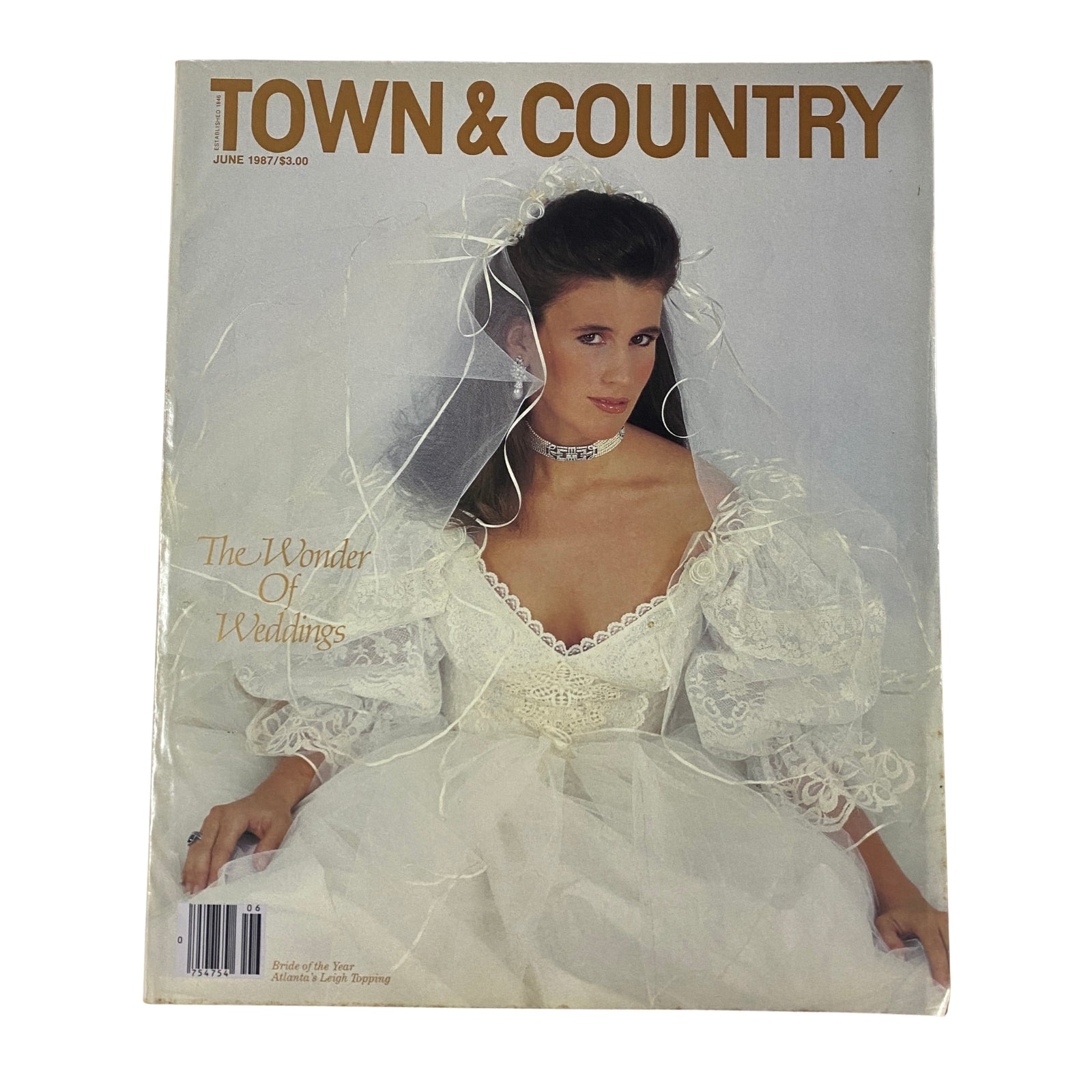 Cover of Town & Country Magazine June 1987 featuring Leigh Topping in a vintage bridal gown, showcasing wedding fashion and elegance.