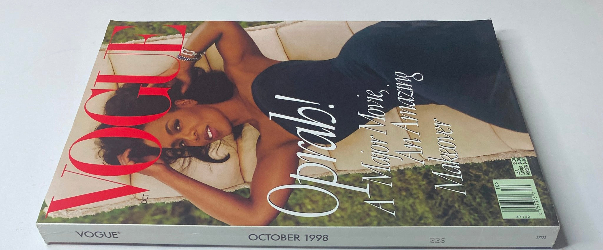 Side view of Vogue Magazine October 1998 showcasing Oprah Winfrey on the cover, emphasizing her influence in fashion.