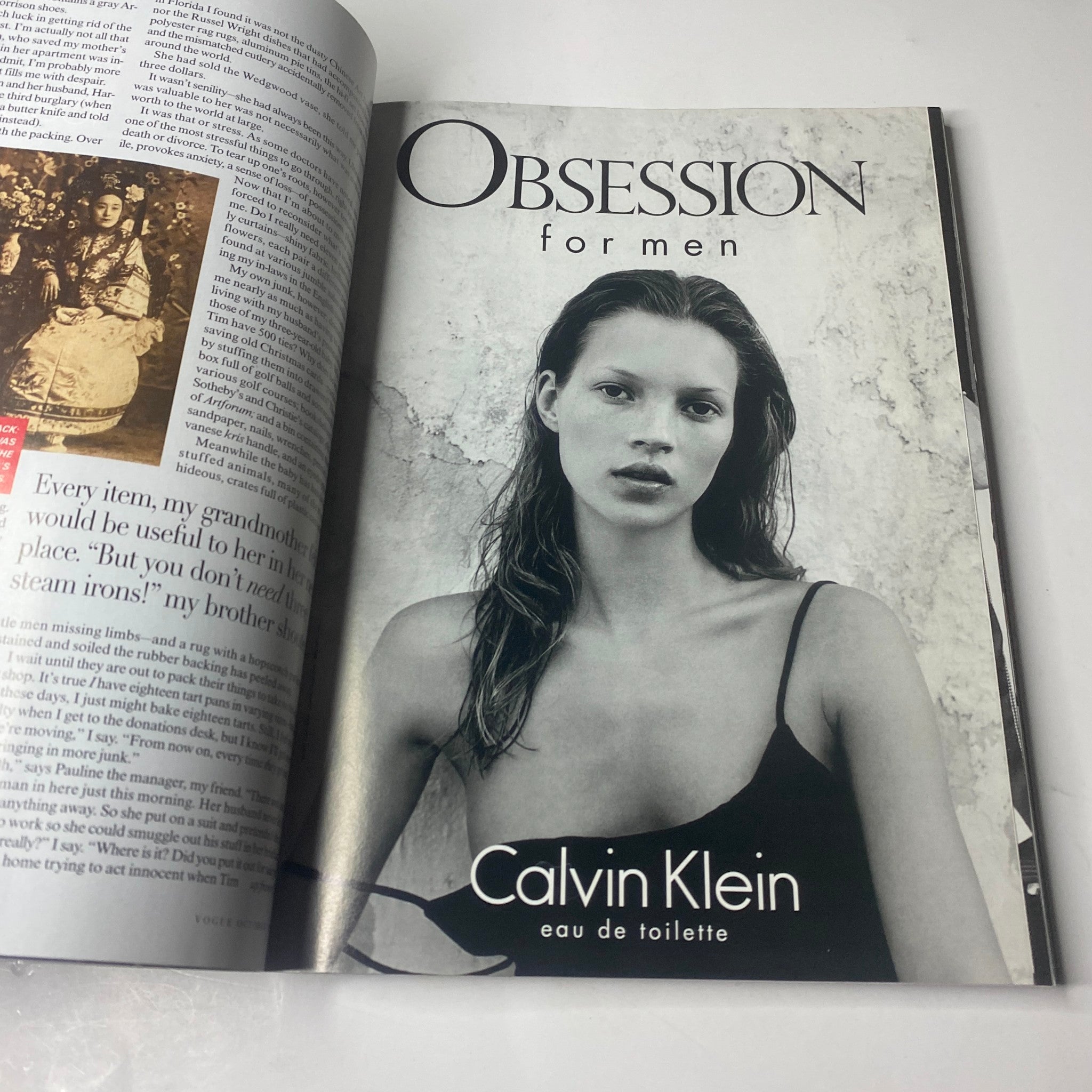 Vogue Magazine October 1998 featuring an advertisement for Calvin Klein's 'Obsession for men' with a model in a black dress. No Label, Very Good Condition.