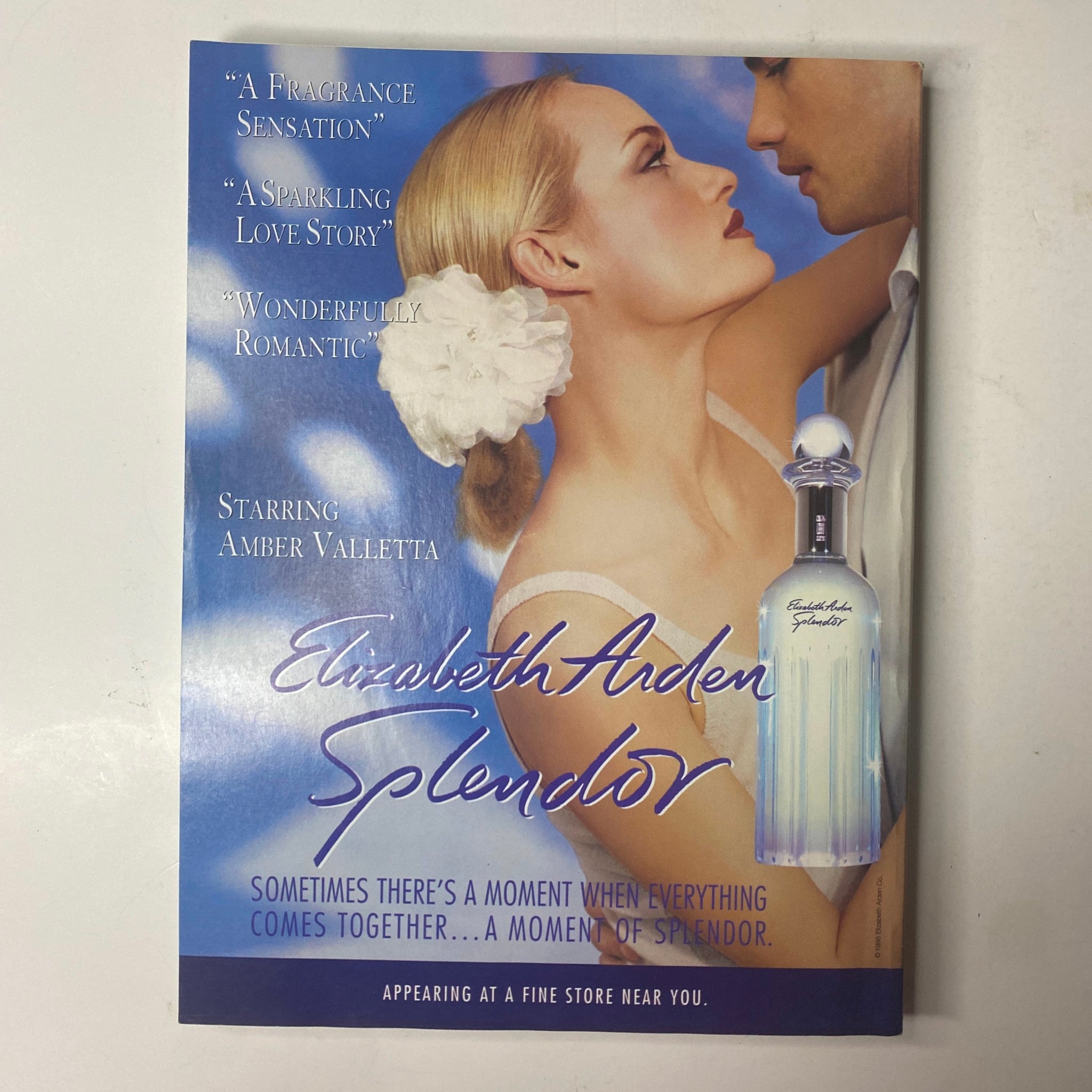 Vogue Magazine October 1998 highlighting an advertisement for Elizabeth Arden's 'Splendor' fragrance featuring a romantic image of a couple. No Label, Very Good Condition.