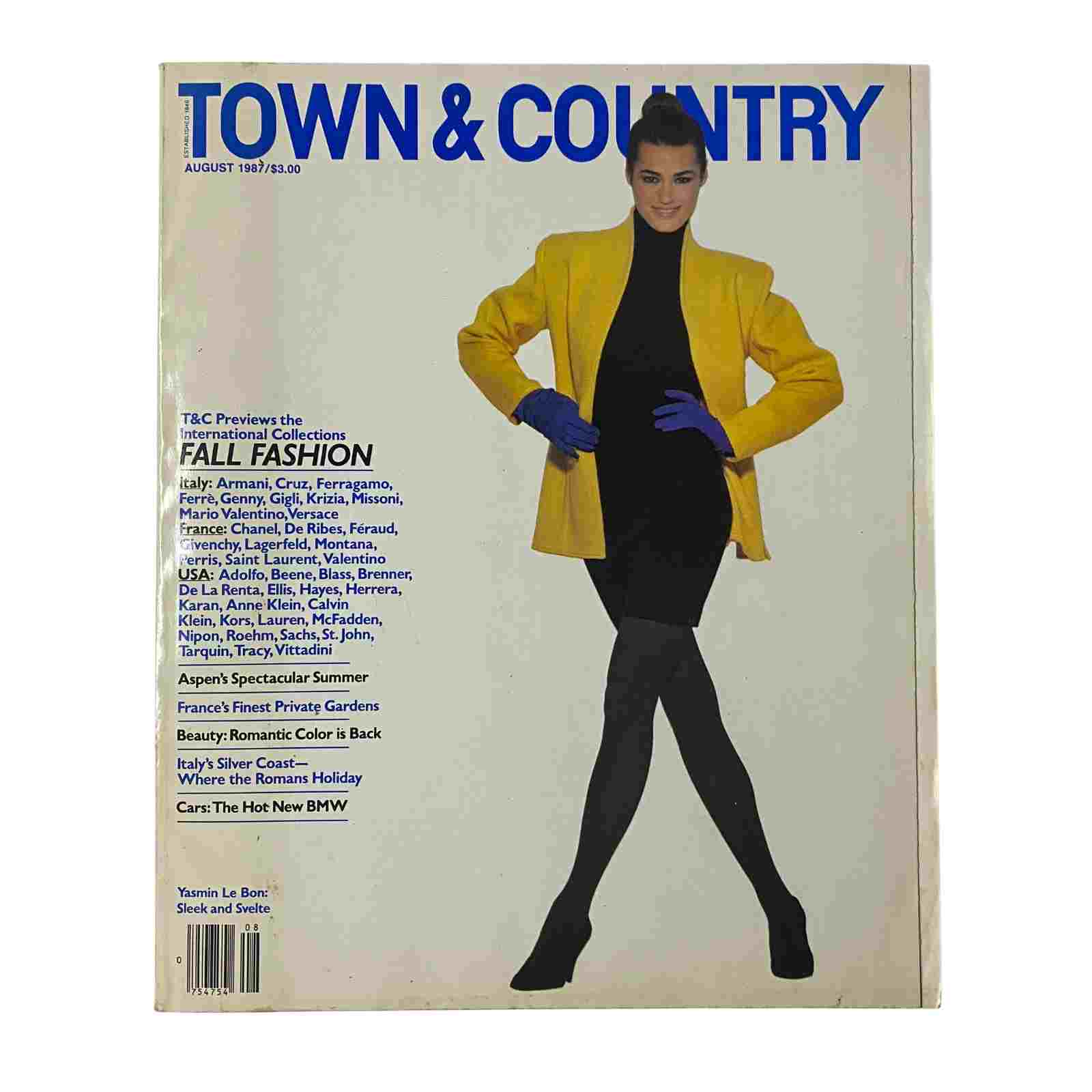 Cover of Town & Country Magazine August 1987, featuring a model in a bright yellow blazer and black outfit, highlighting Fall Fashion. Emphasizes iconic designers and high fashion from the late 1980s.