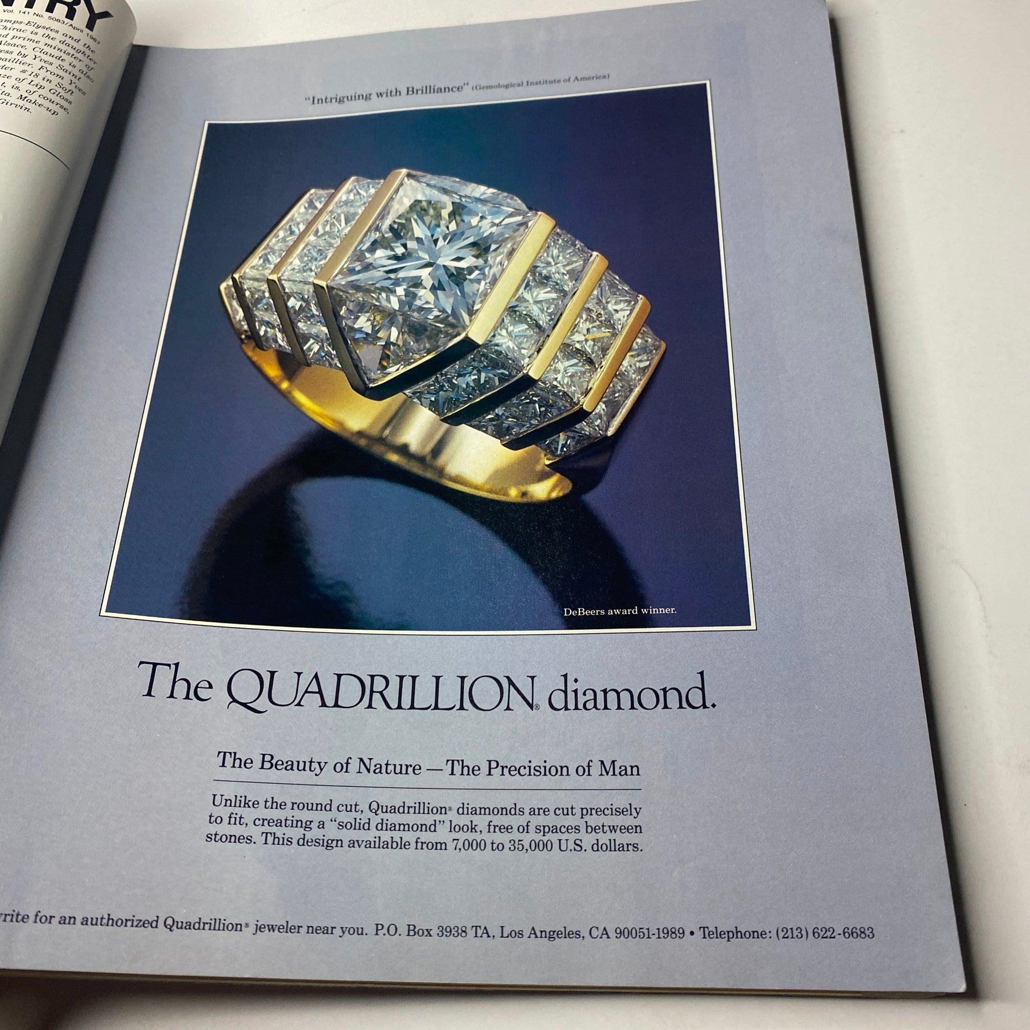 Advertisement in Town & Country Magazine April 1987 featuring the Quadrillion diamond ring, promoting luxury jewelry design.
