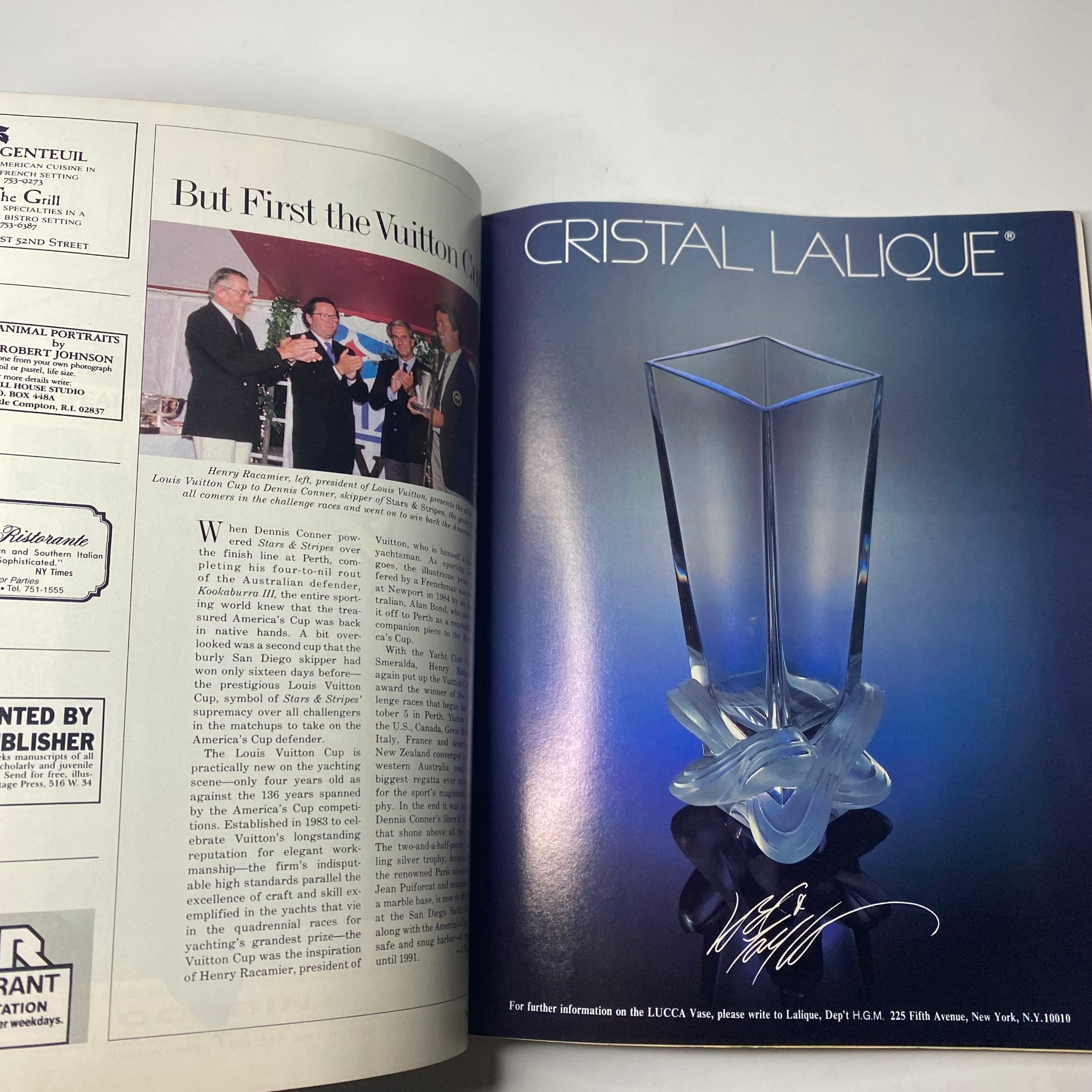 Advertisement in Town & Country Magazine April 1987 for Cristal Lalique, displaying an elegant glass vase with artistic design.