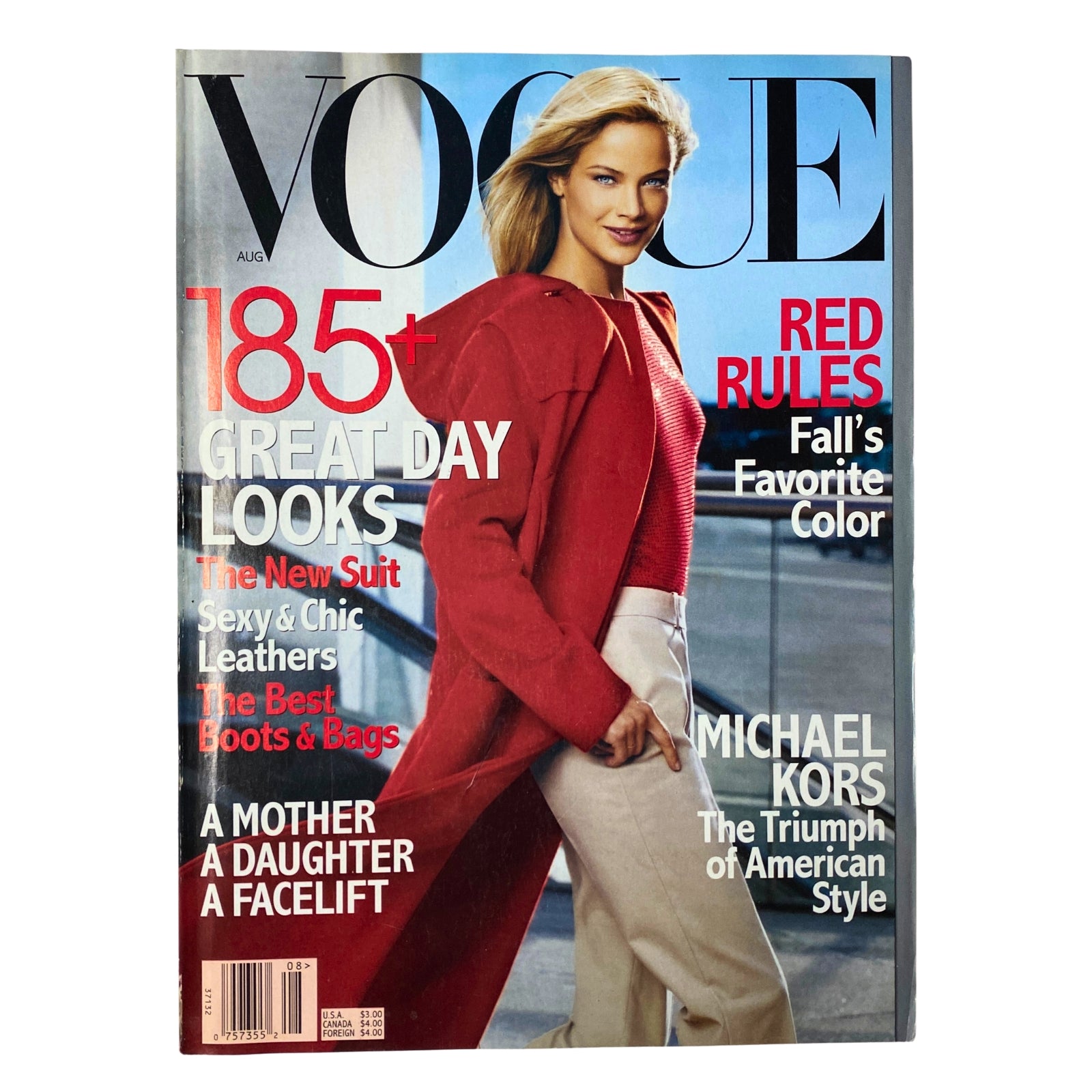 Vogue Magazine August 1999 featuring Carolyn Murphy on the cover, showcasing a stylish red outfit. Collectible vintage fashion magazine in very good condition.