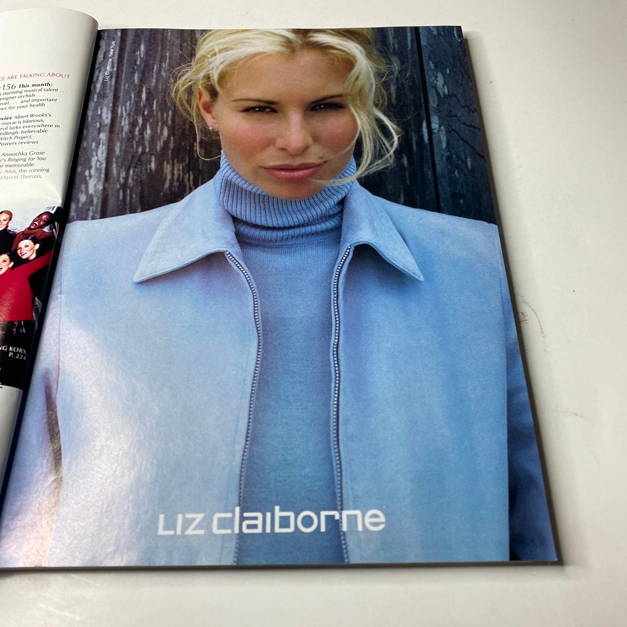 Vogue Magazine August 1999, displaying a fashion advertisement for Liz Claiborne featuring a model in a stylish outfit.