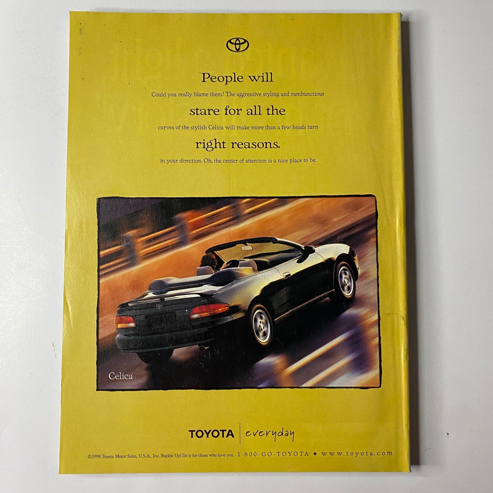Vogue Magazine August 1999, featuring a Toyota Celica advertisement promoting its stylish design and driving experience.