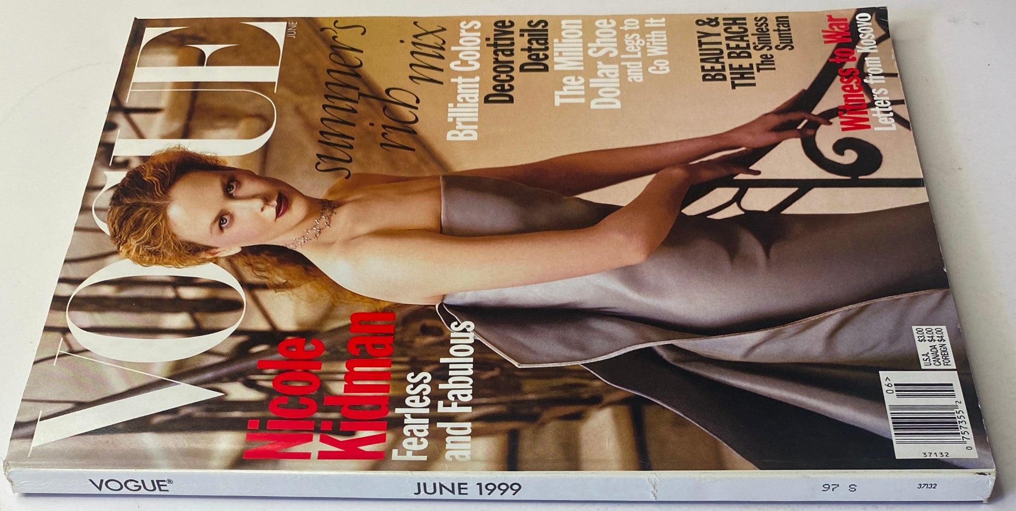 Side view of Vogue Magazine June 1999 with Nicole Kidman on the cover, emphasizing the title and the phrase 'Fearless and Fabulous'. This issue is collectible for fashion enthusiasts.
