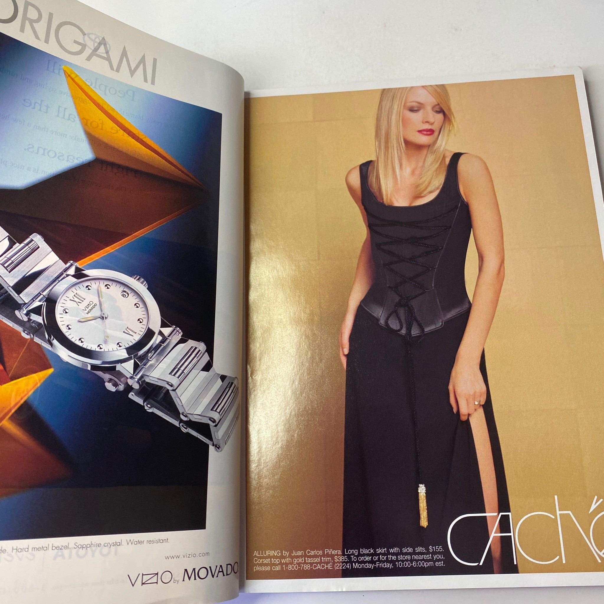Fashion advertisement from Vogue Magazine May 1999 featuring a model in a stylish outfit by CACHÉ, showcasing high fashion and design aesthetics of the late 1990s.