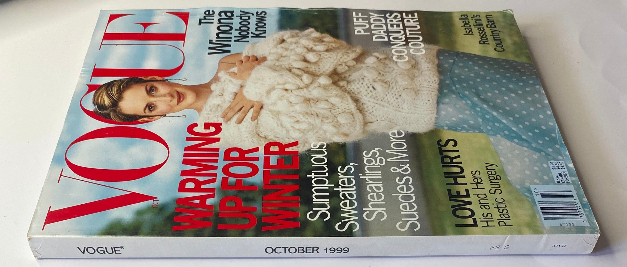 Side view of Vogue Magazine October 1999 showcasing Winona Ryder, emphasizing the issue's focus on winter styles and beauty insights.