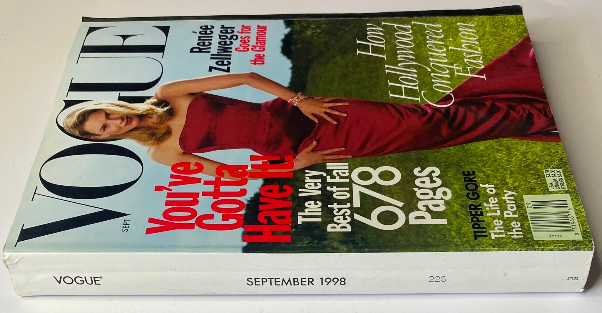 Side view of Vogue Magazine September 1998 showcasing Renée Zellweger on the cover in a stunning red dress, emphasizing 'You've Gotta Have It!' and 'Best of Fall' inside.