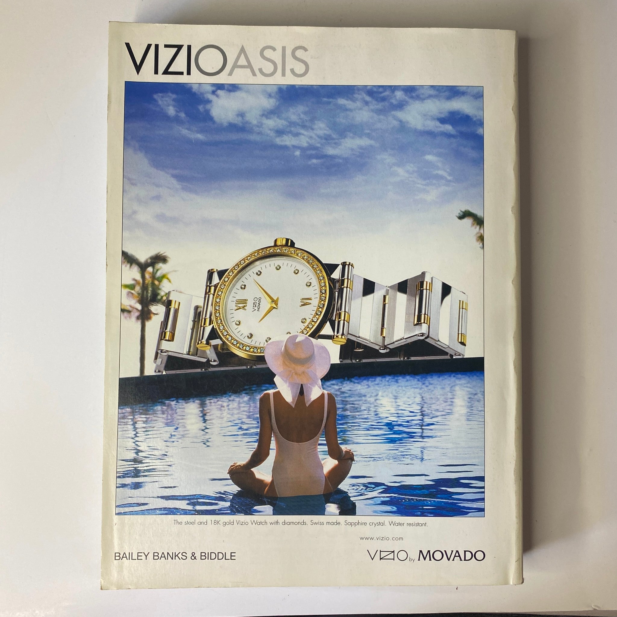 Vogue Magazine September 1998 cover image featuring a stylish watch advertisement for Vizioasis, capturing luxury lifestyle aesthetics.