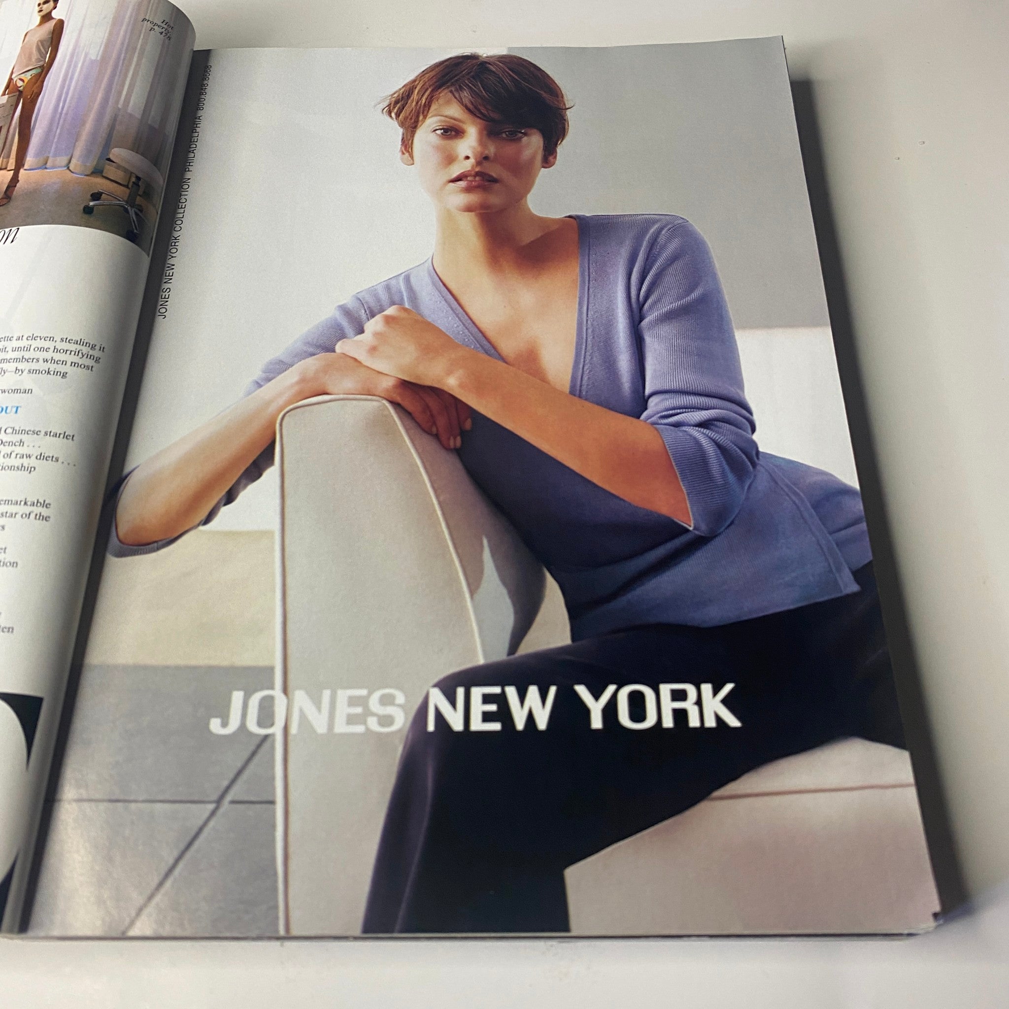 Vogue Magazine March 1999 advertisement page featuring a model in a blue outfit for Jones New York. The ad emphasizes modern fashion aesthetics.