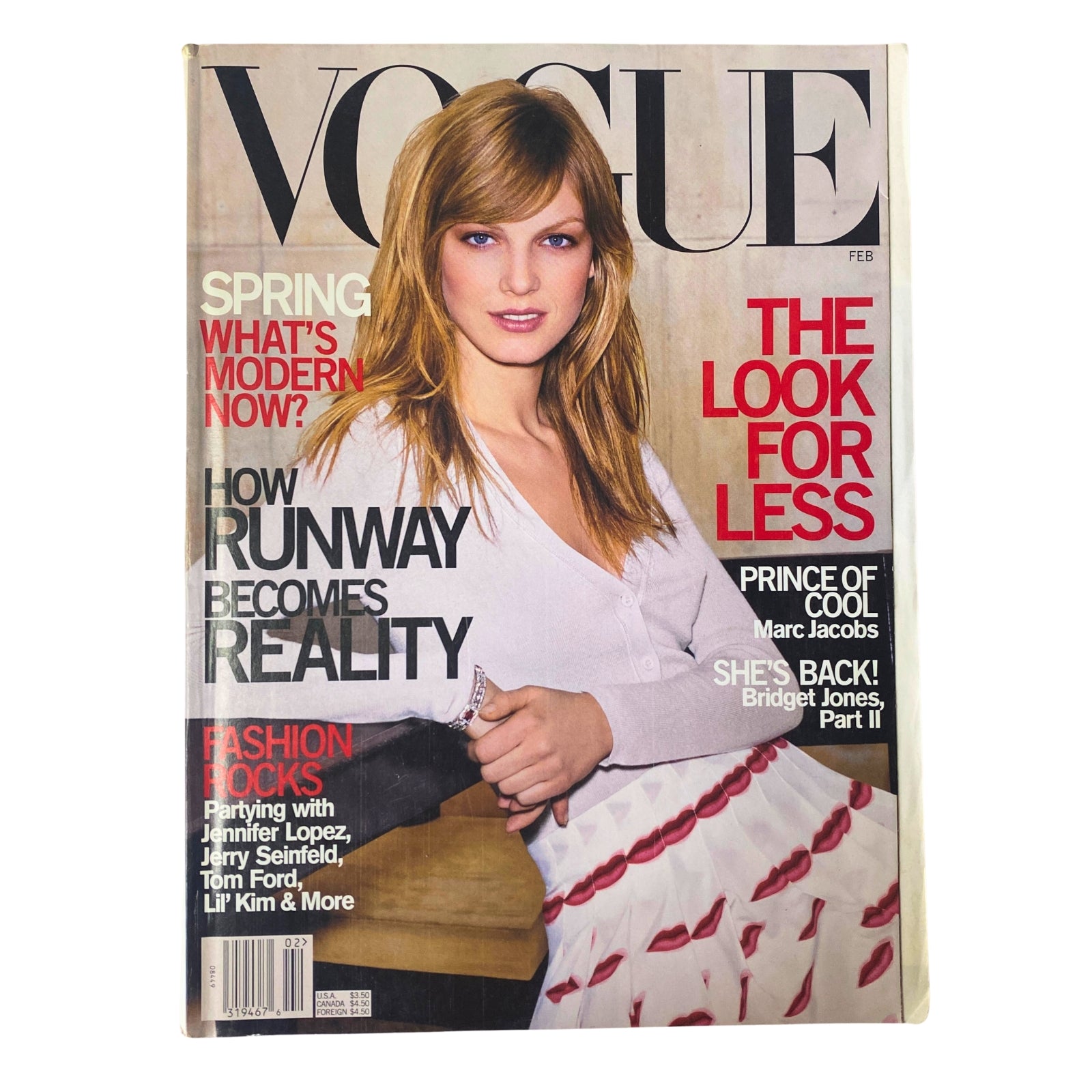 Cover of Vogue Magazine February 2000 featuring Angela Lindvall, with headlines discussing fashion trends and runway reality. The issue captures a pivotal moment in early 2000s fashion, emphasizing Angela Lindvall's role as a model.