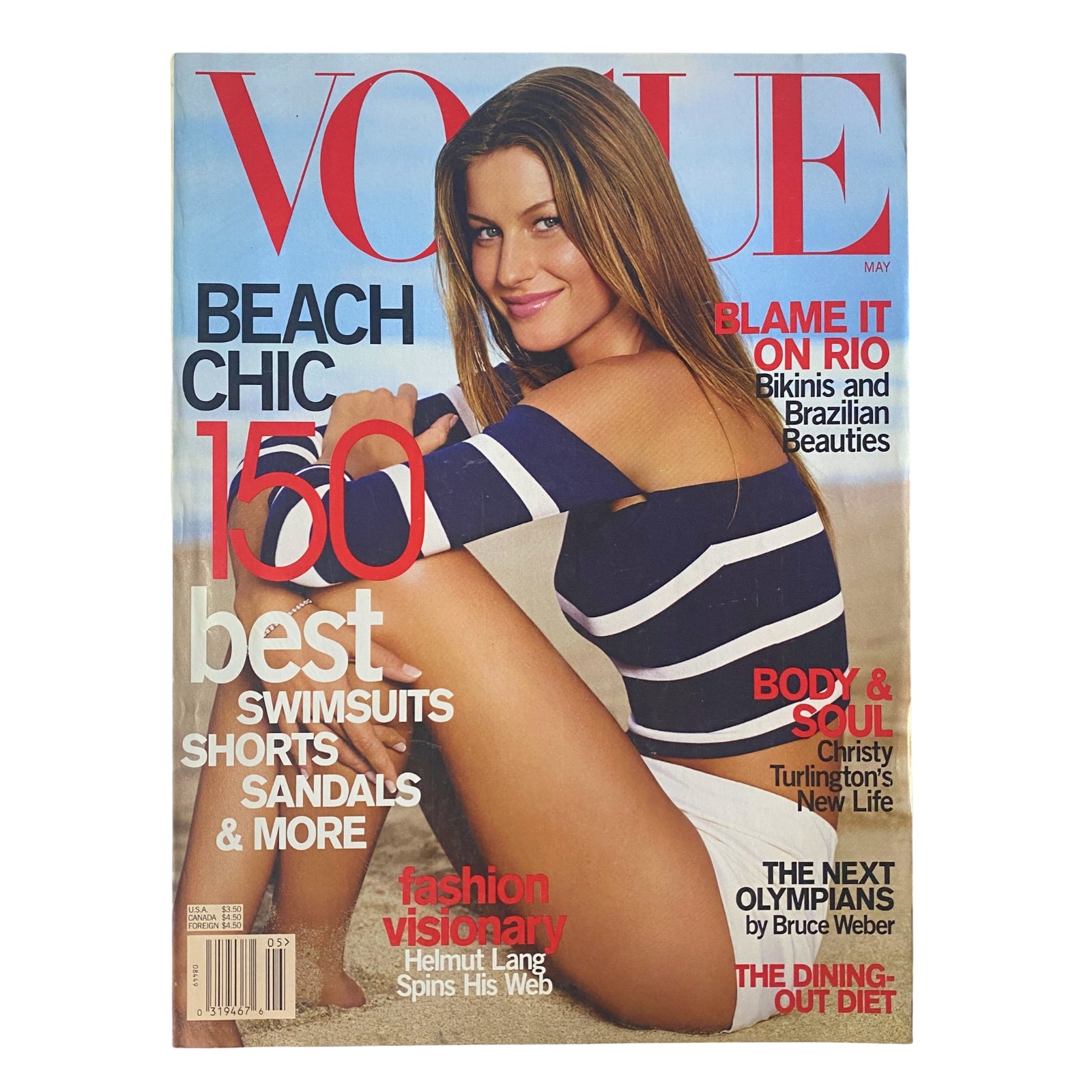 Cover of Vogue Magazine May 2000 featuring Gisele Bündchen in a swimsuit. The title highlights 'Beach Chic' and includes features like 'Blame It on Rio' and '150 Best Swimsuits, Shorts, Sandals & More'.