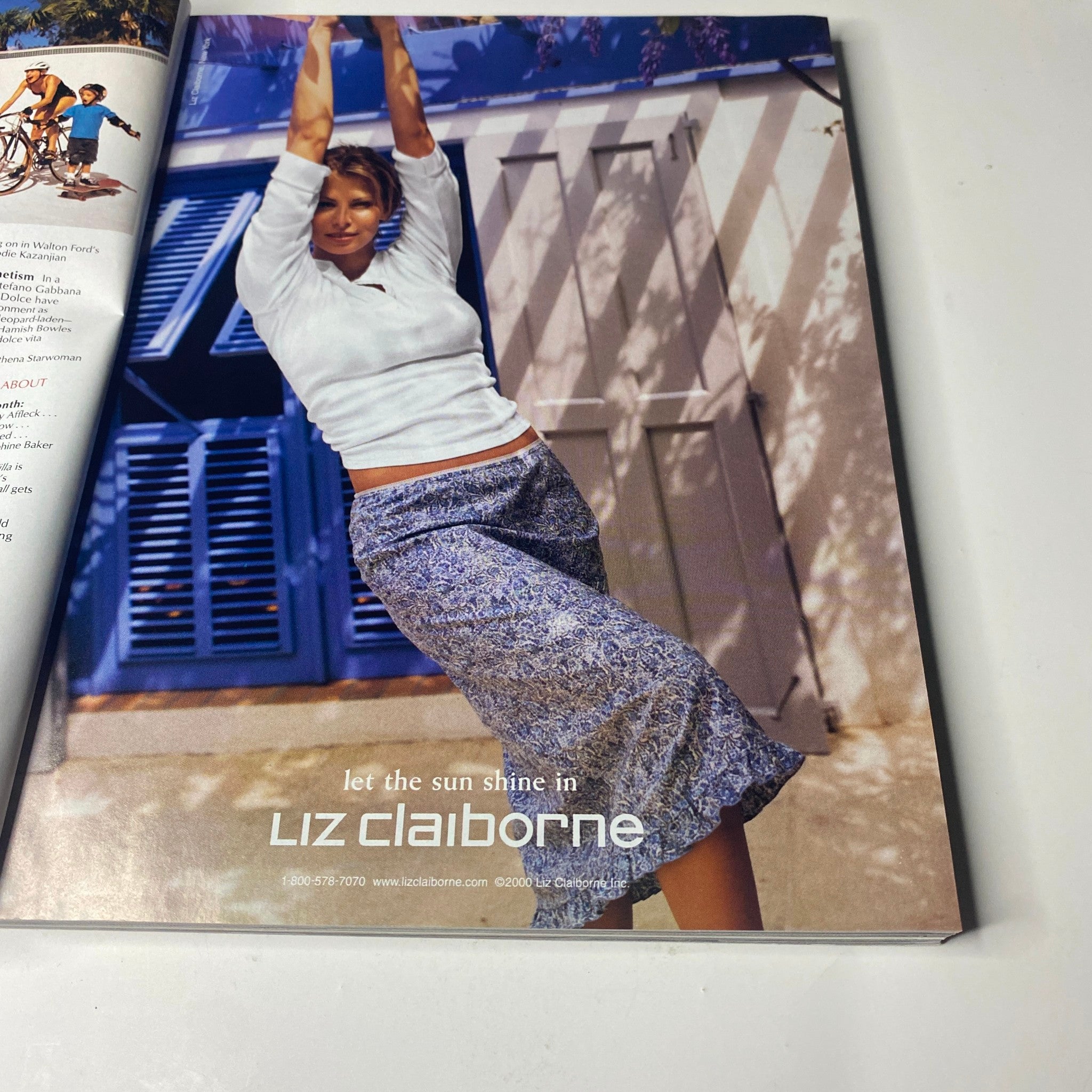 Vogue Magazine May 2000 Gisele Bündchen Cover featuring a Liz Claiborne advertisement showcasing a model in casual attire against a textured background promoting summer fashion.