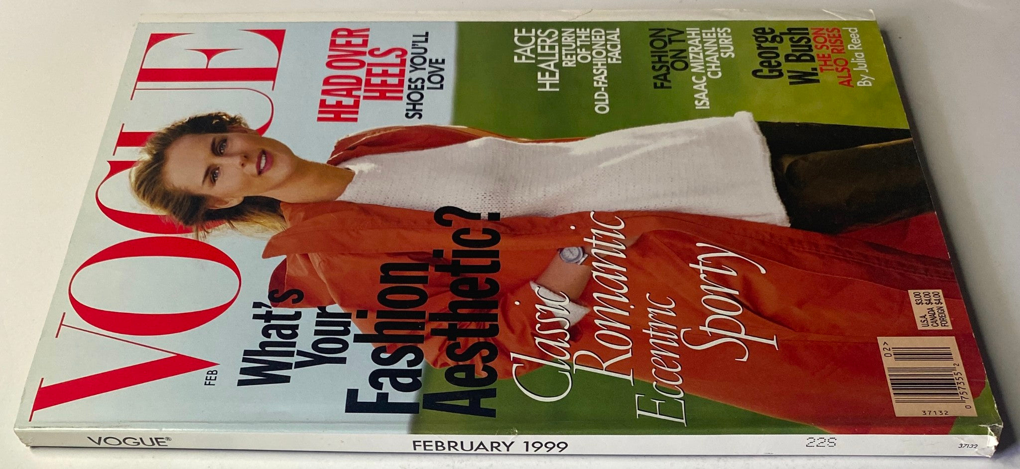 Another view of the cover of Vogue Magazine February 1999 with Stella Tennant, highlighting the phrase 'Head Over Heels: Shoes You'll Love.' The cover emphasizes classic romantic style.
