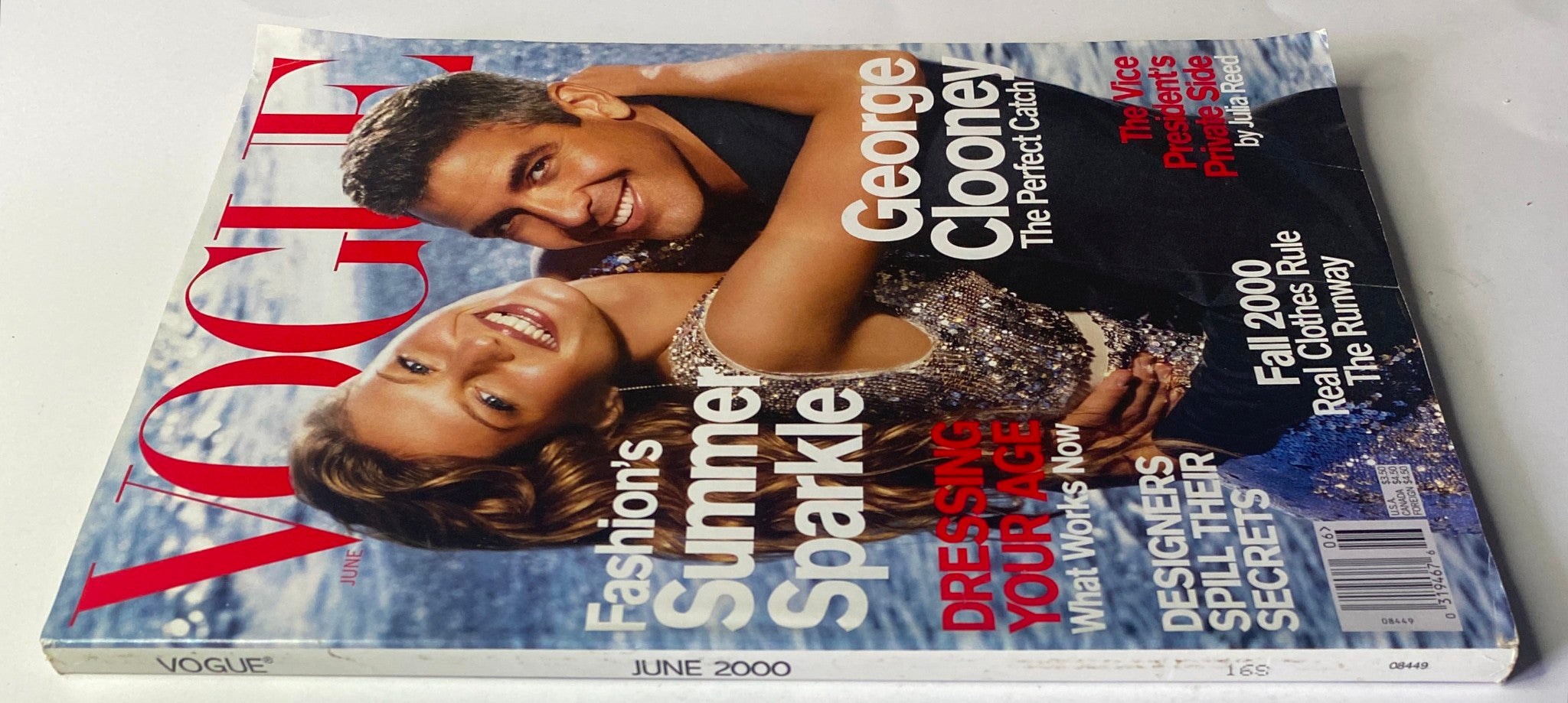 Alternate view of the June 2000 Vogue Magazine cover showcasing Gisele Bündchen and George Clooney, emphasizing fashion trends and features.