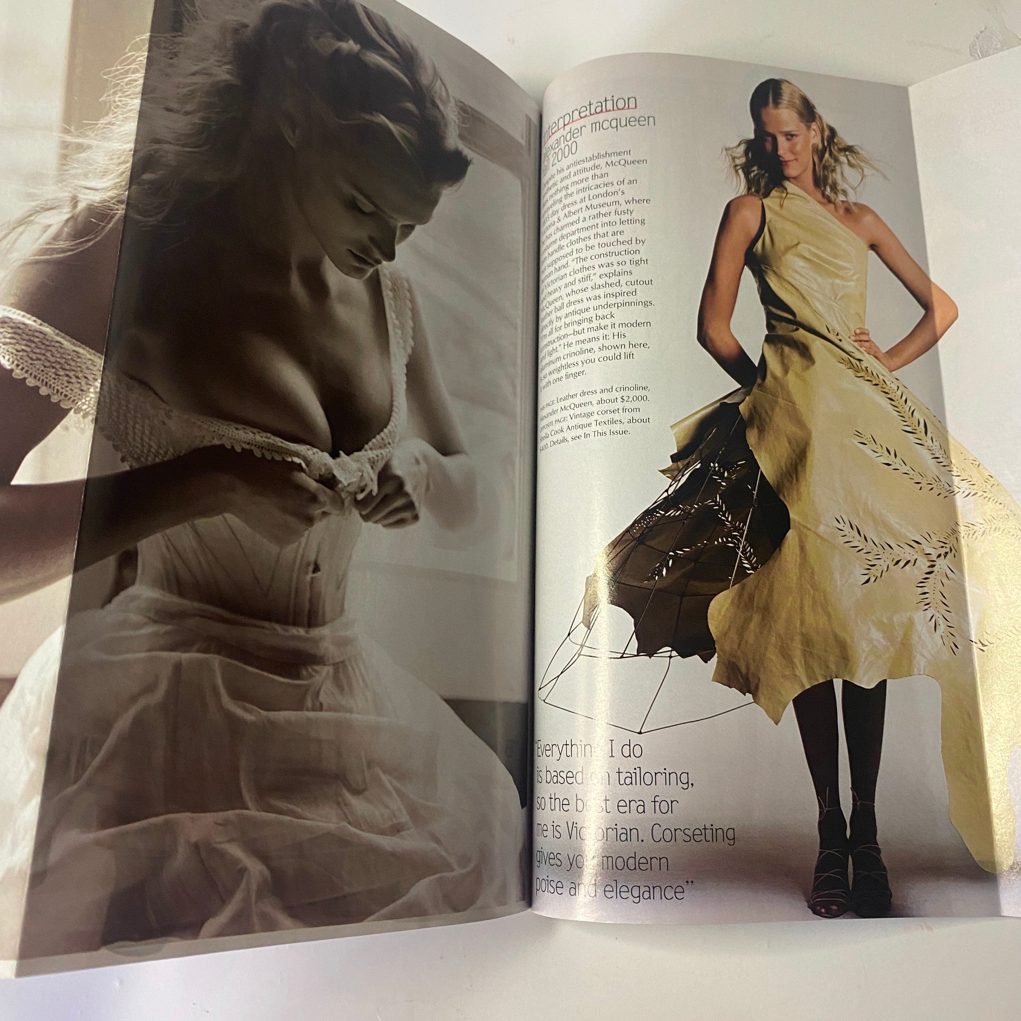 Fashion editorial from Vogue Magazine June 2000 illustrating an Alexander McQueen dress with stunning details and design elements, capturing the essence of haute couture.