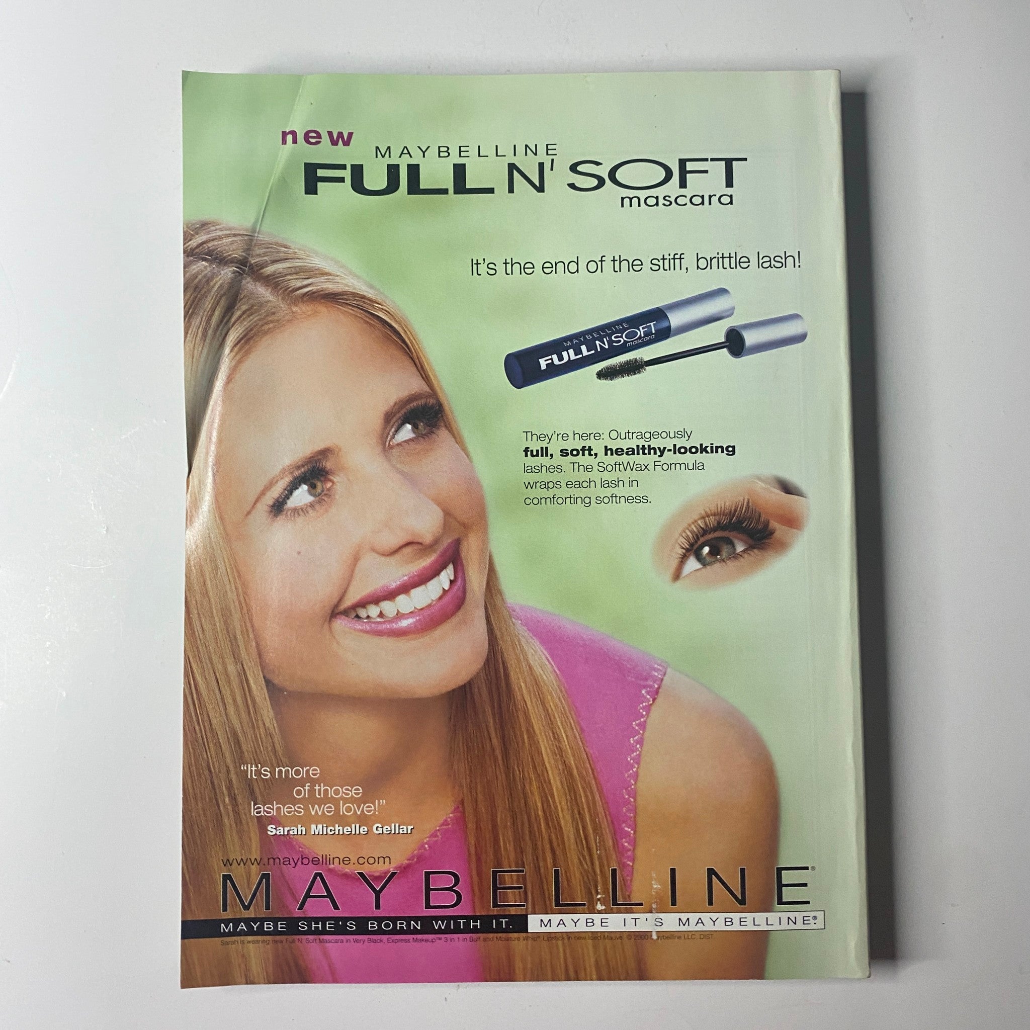 Full page advertisement for Maybelline Full 'N Soft mascara featured in Vogue Magazine April 2000, highlighting the product as a beauty essential for achieving soft, healthy-looking lashes.