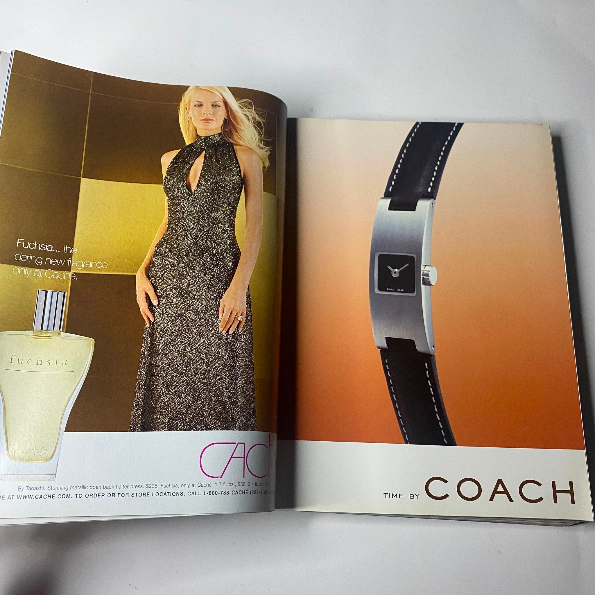 Vogue Magazine November 2000 advertisement for Coach, featuring a stylish watch and the Fuchsia fragrance, highlighting luxury fashion trends of the time.