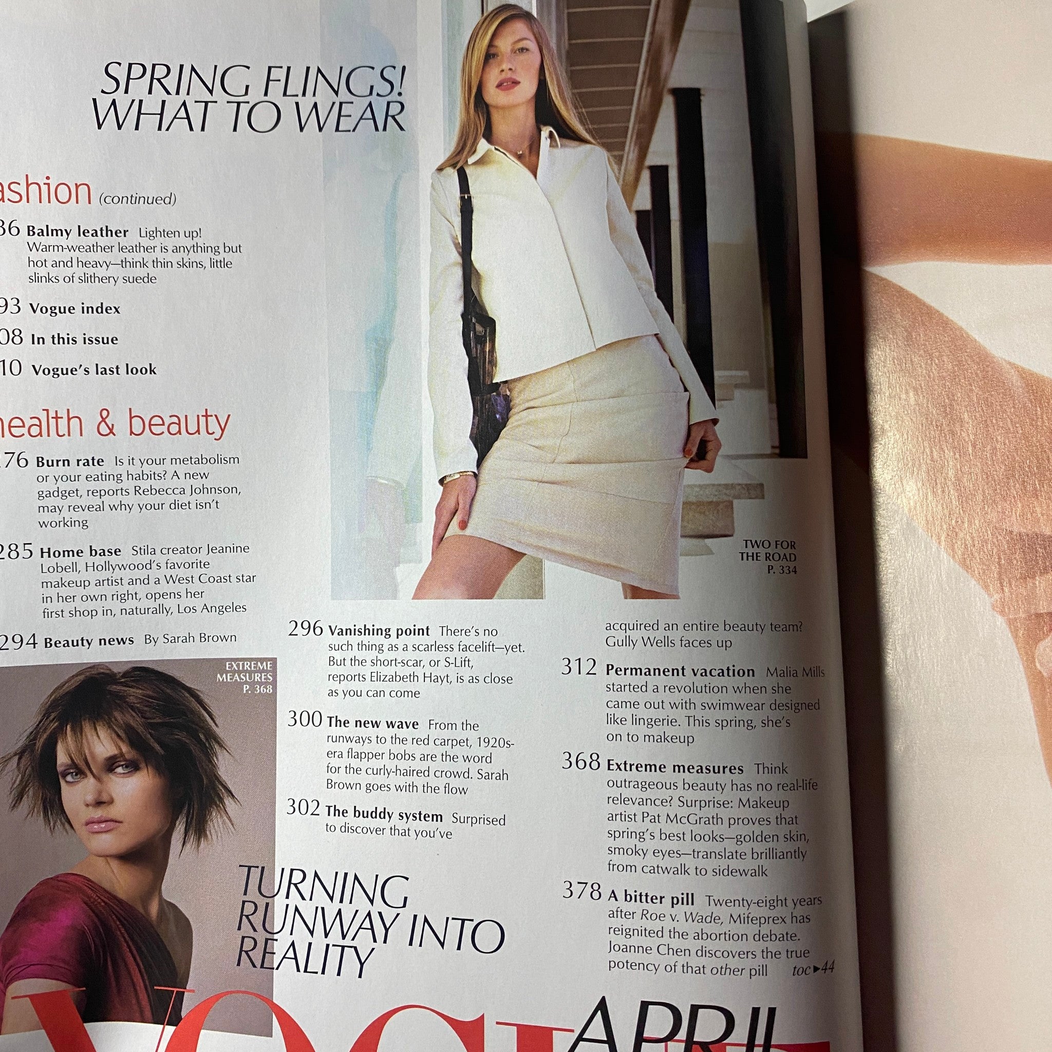 Inside page of Vogue Magazine April 2001 featuring a fashion spread titled 'Spring Flings! What to Wear', showcasing chic outfits and modern styles of the early 2000s.