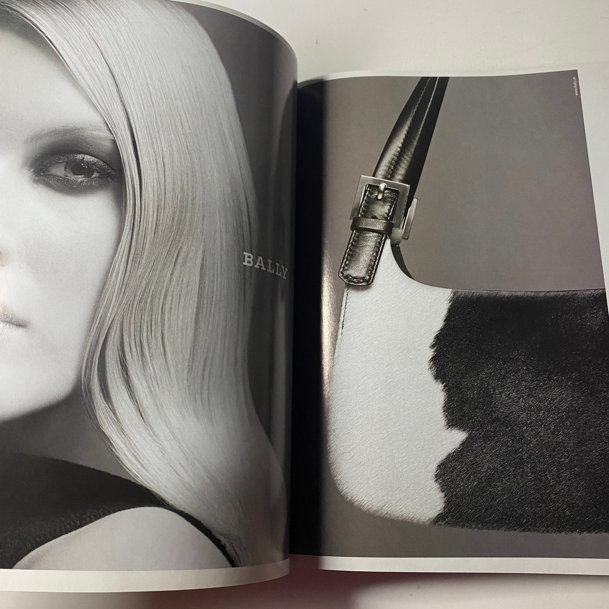 Vogue Magazine March 2000 Amber Valletta Cover, featuring a stunning black and white editorial spread showcasing fashion accessories by Bally.