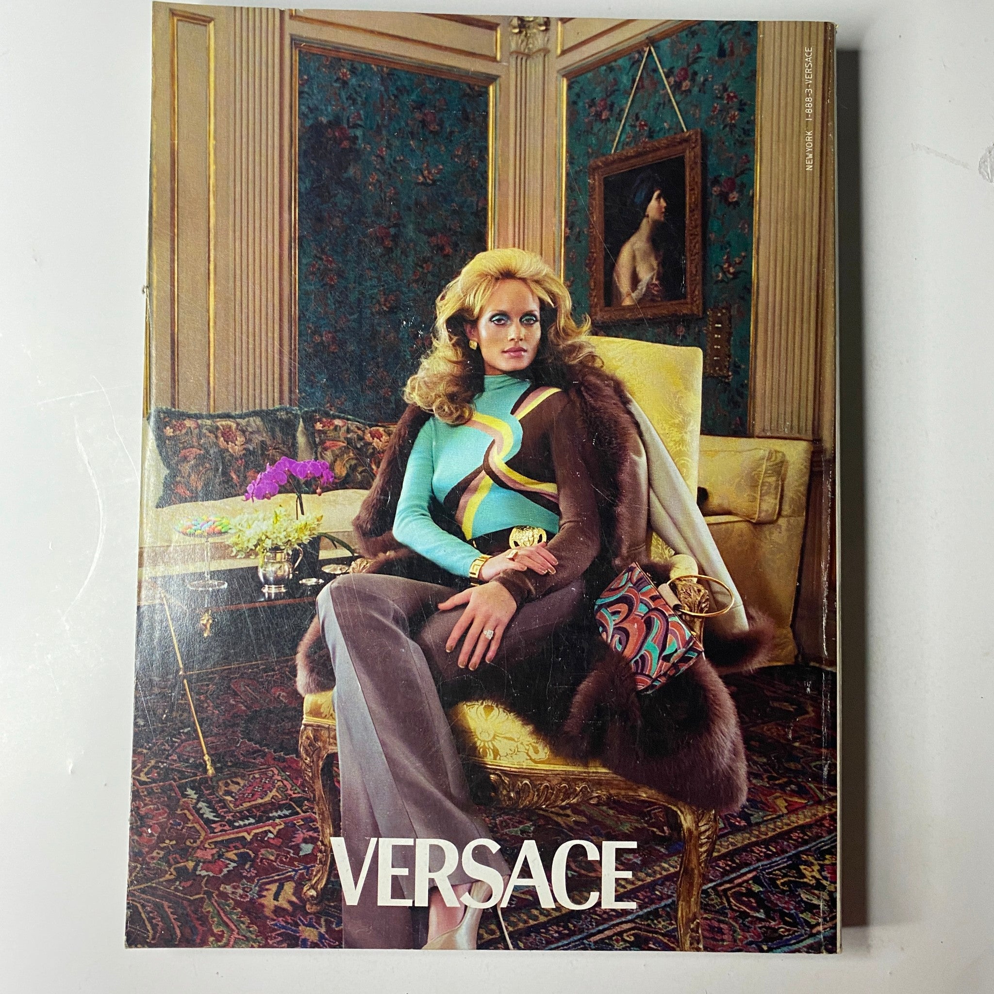 Vogue Magazine October 2000 featuring Charlize Theron on the cover, showcasing retro-inspired fashion and key designers of the season. The cover highlights the blend of vintage and modern styles in fashion.