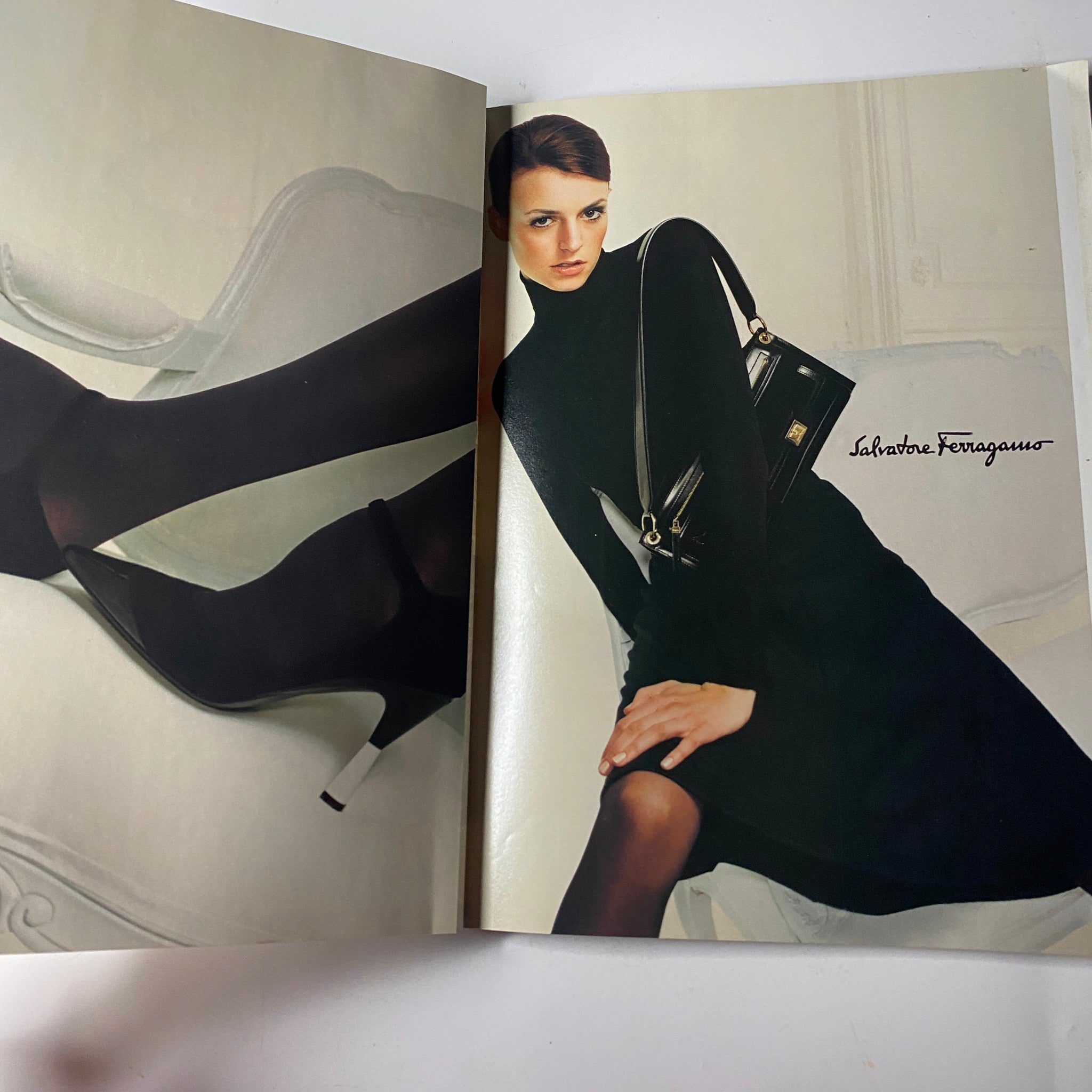 Vogue Magazine July 2001 displaying a sophisticated Salvatore Ferragamo advertisement featuring elegant footwear and accessories modeled in a chic editorial style.