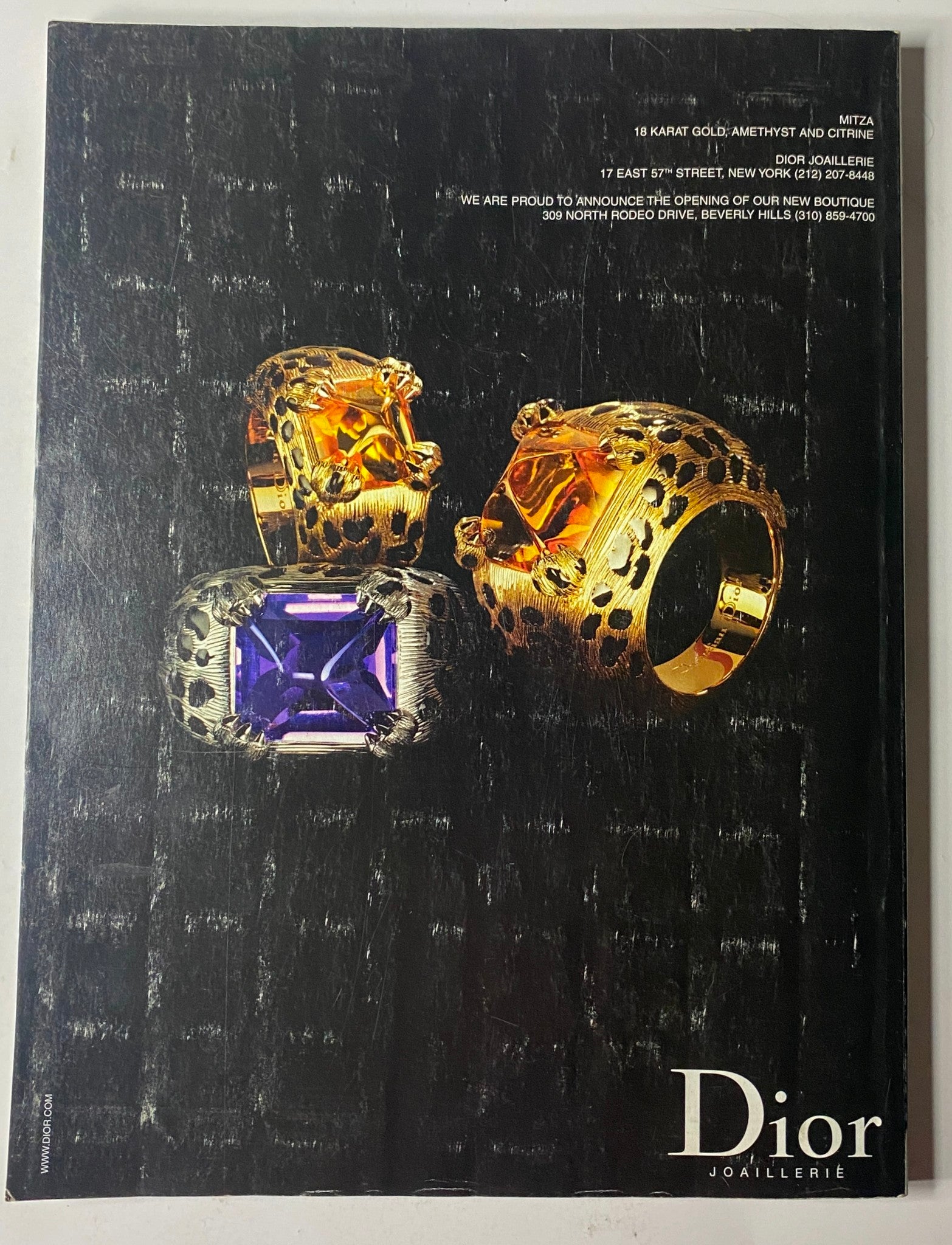 Vogue Magazine February 2002 Sarah Jessica Parker Cover No Label presents the back cover featuring luxurious Dior joaillerie, showcasing 18-karat gold accessories with an elegant design.