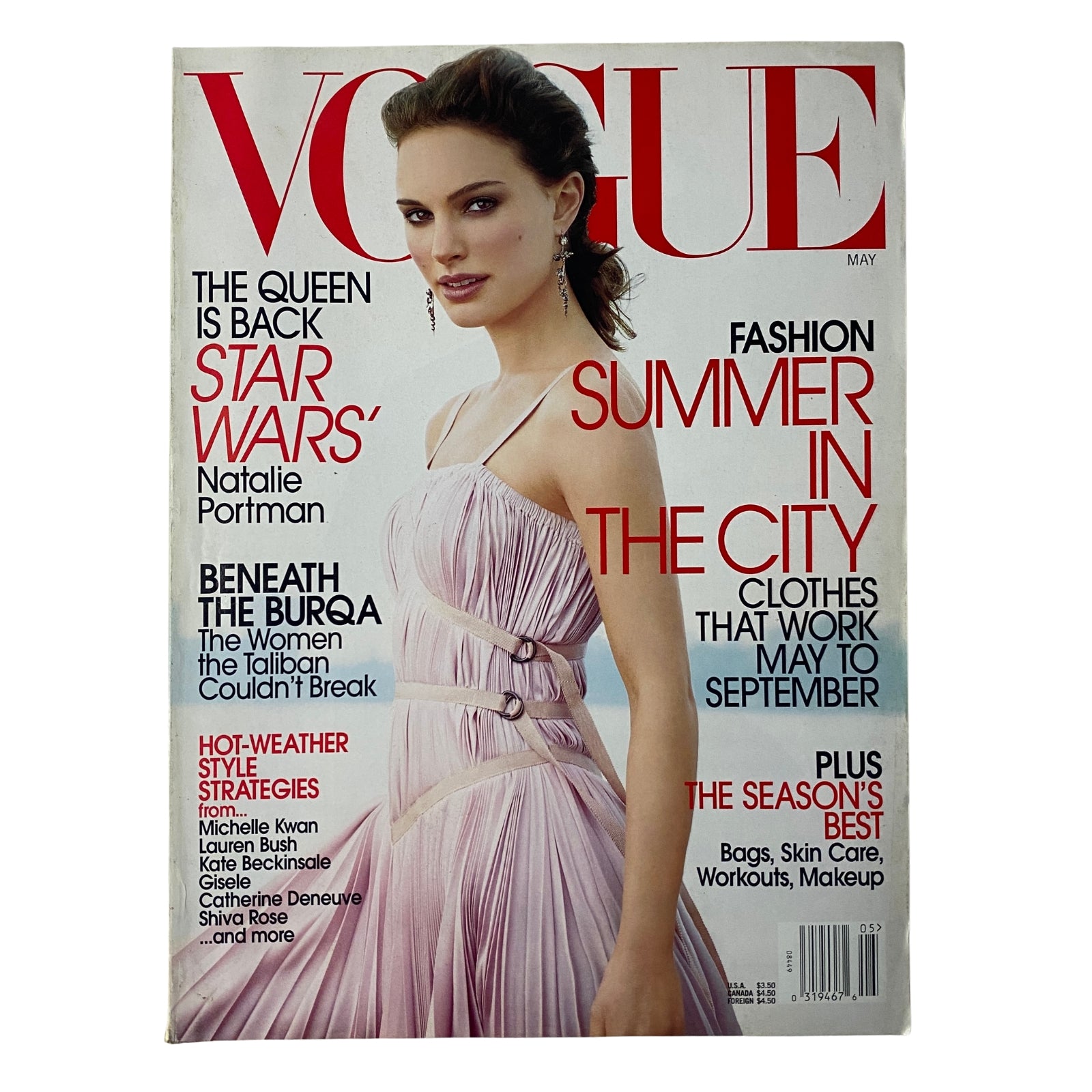 Vogue Magazine May 2002 cover featuring Natalie Portman, highlighting fashion and style with the theme 'Summer in the City'. This iconic issue showcases Portman amidst her rising stardom during the Star Wars prequels.