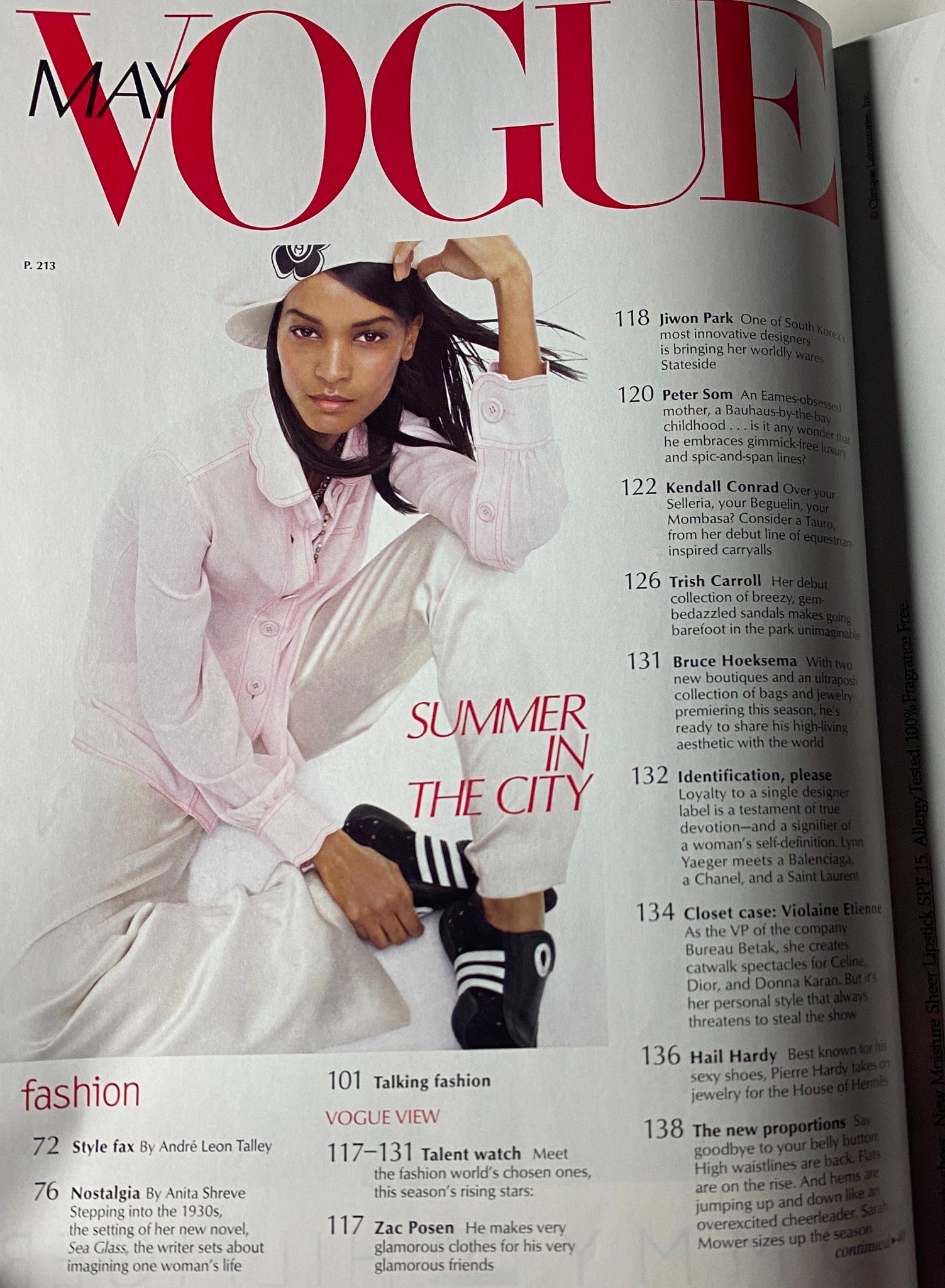 Inside page of Vogue Magazine May 2002 showcasing a fashion article titled 'Summer in the City' featuring a model in casual attire.