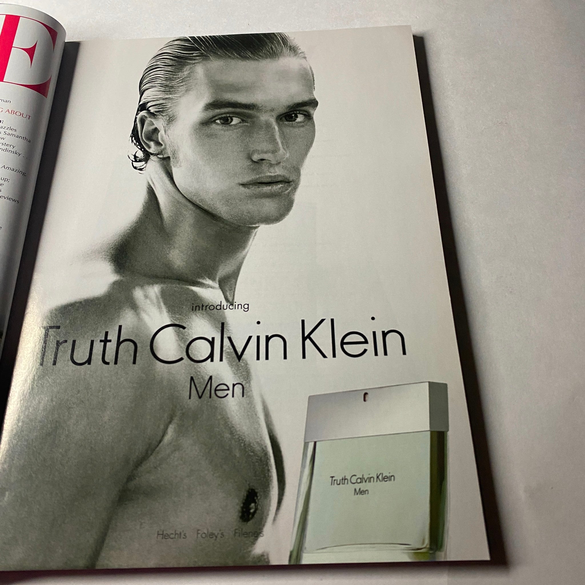 Vogue Magazine June 2002 advertisement for Truth Calvin Klein Men, showcasing a model with an artistic, minimalist presentation.