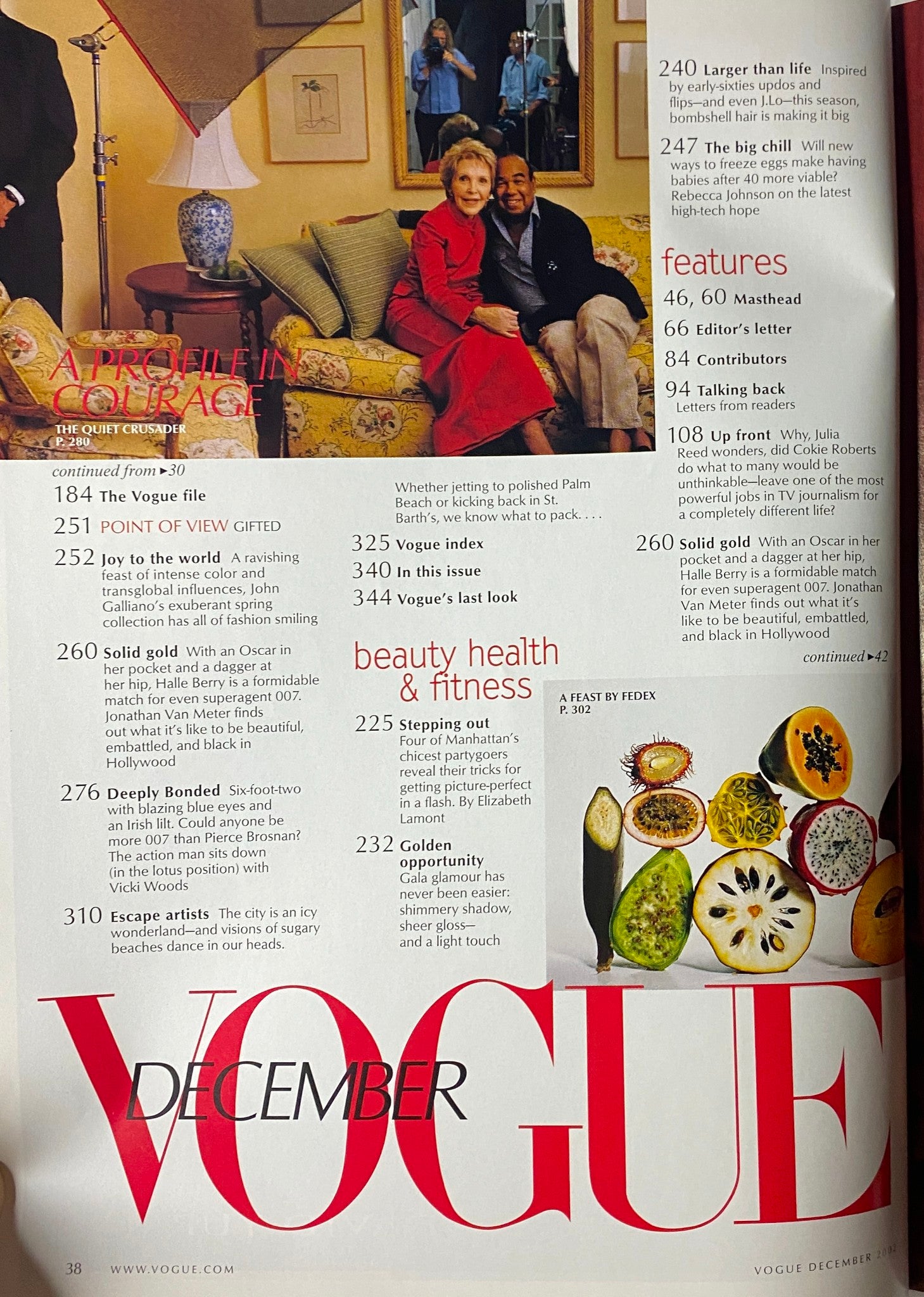Inside page of Vogue Magazine December 2002, showcasing features on fashion, health, and beauty, alongside a profile of Halle Berry.