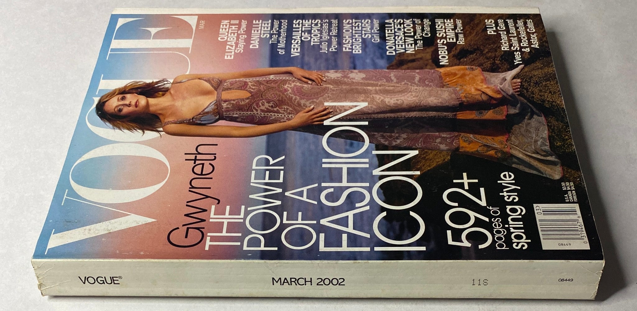 Back cover of Vogue Magazine March 2002 edition with a close-up view, featuring Gwyneth Paltrow, emphasizing 'The Power of a Fashion Icon' and listing magazine highlights.