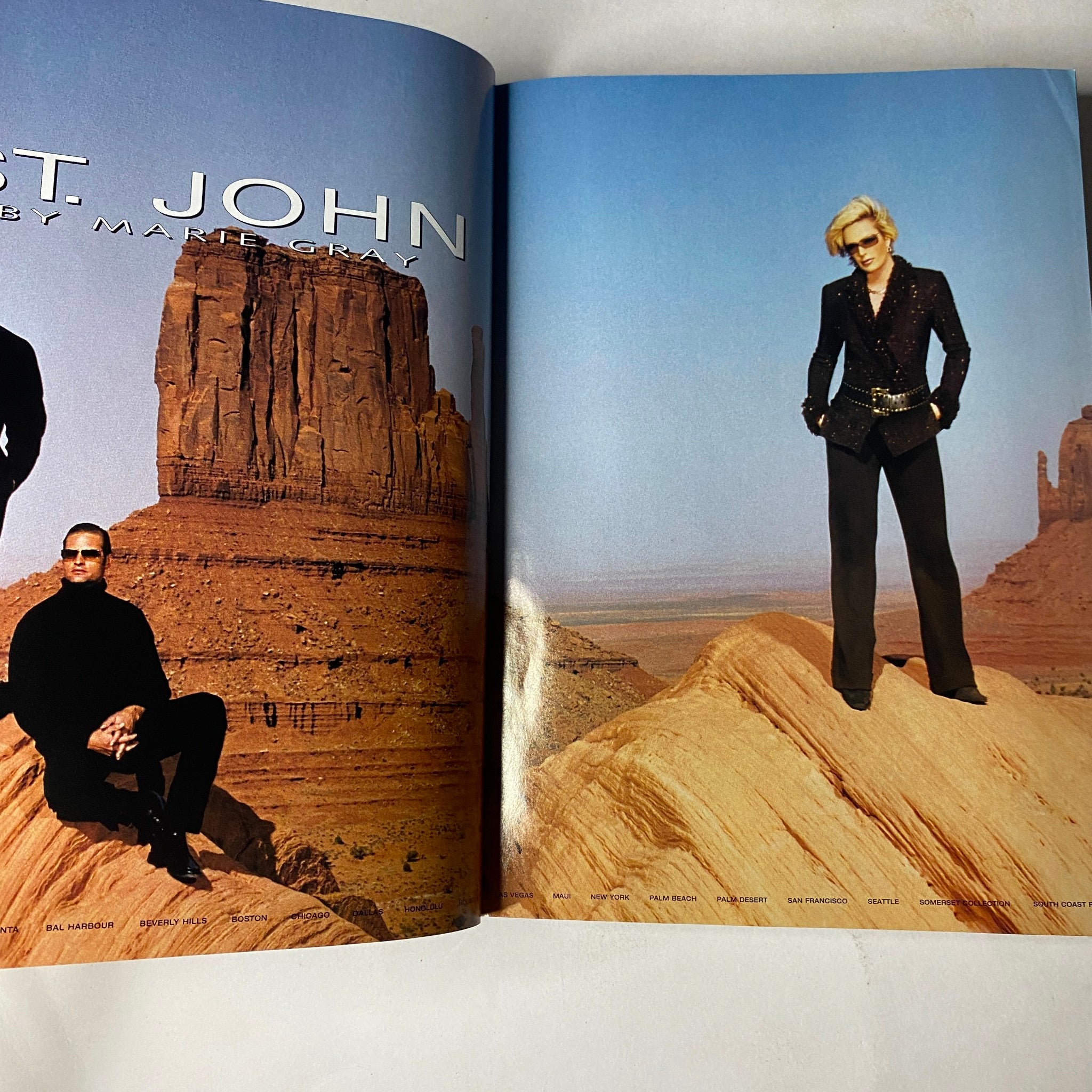 Vogue Magazine September 2002 showcasing a fashion spread for St. John against a stunning desert backdrop, highlighting luxurious styles.