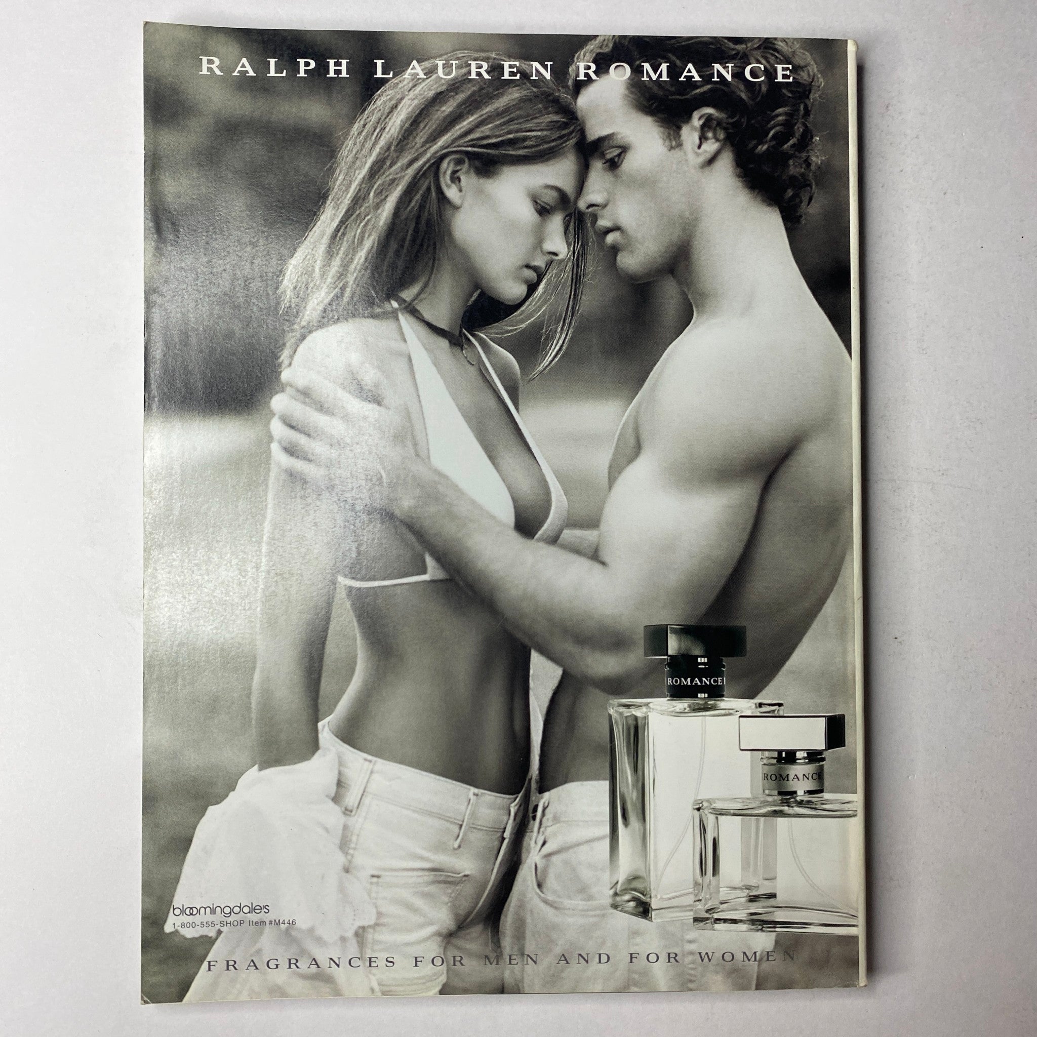 Ralph Lauren Romance advertisement from Vogue Magazine April 2003, depicting a couple embracing, highlighting fragrances for men and women.