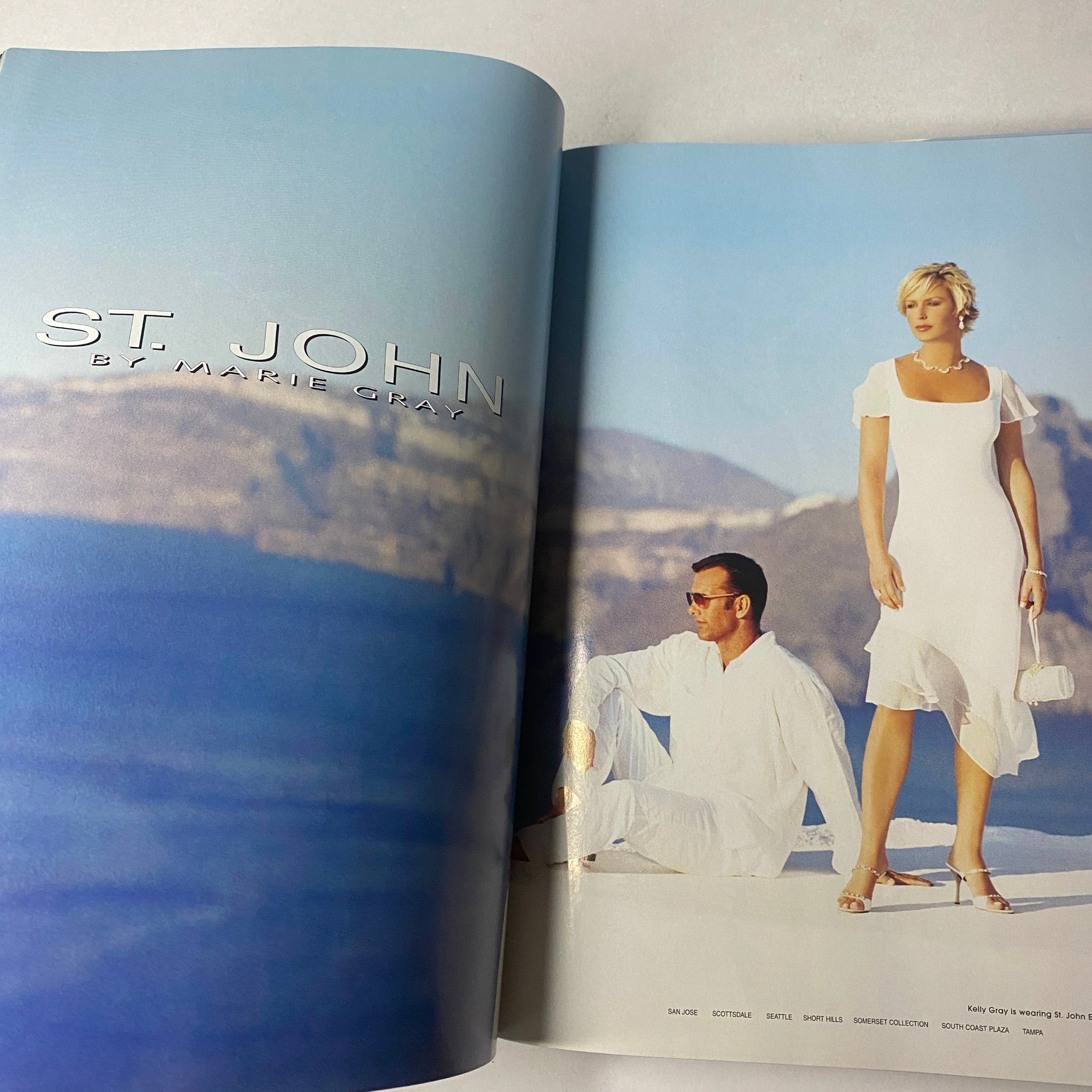 Vogue Magazine March 2003 Julianne Moore Cover No Label VG displaying a fashion advertisement for St. John by Marie Gray, highlighting summer styles.