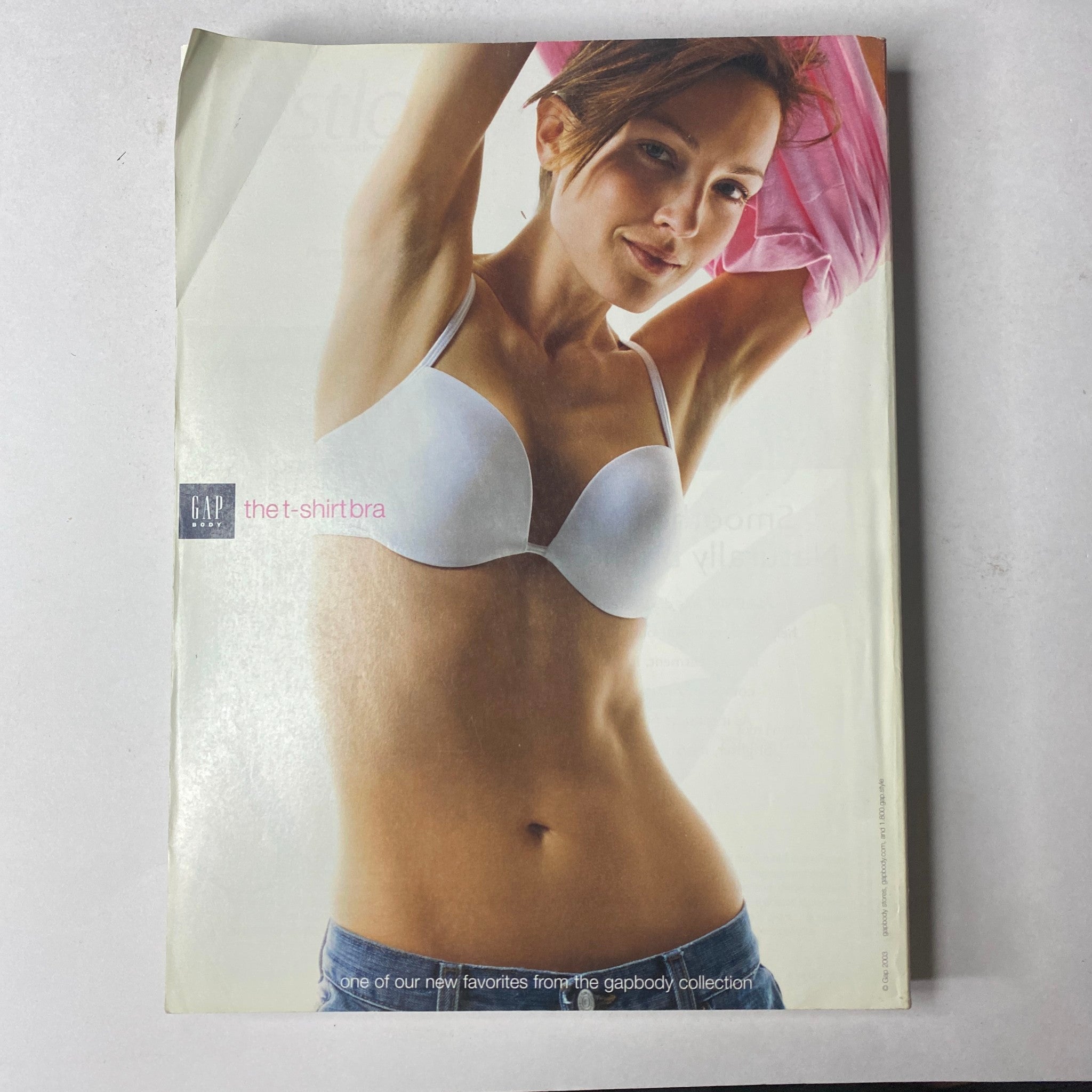 Vogue Magazine March 2003 Julianne Moore Cover No Label VG featuring an advertisement for GAP's t-shirt bra, showcasing clothing styles.