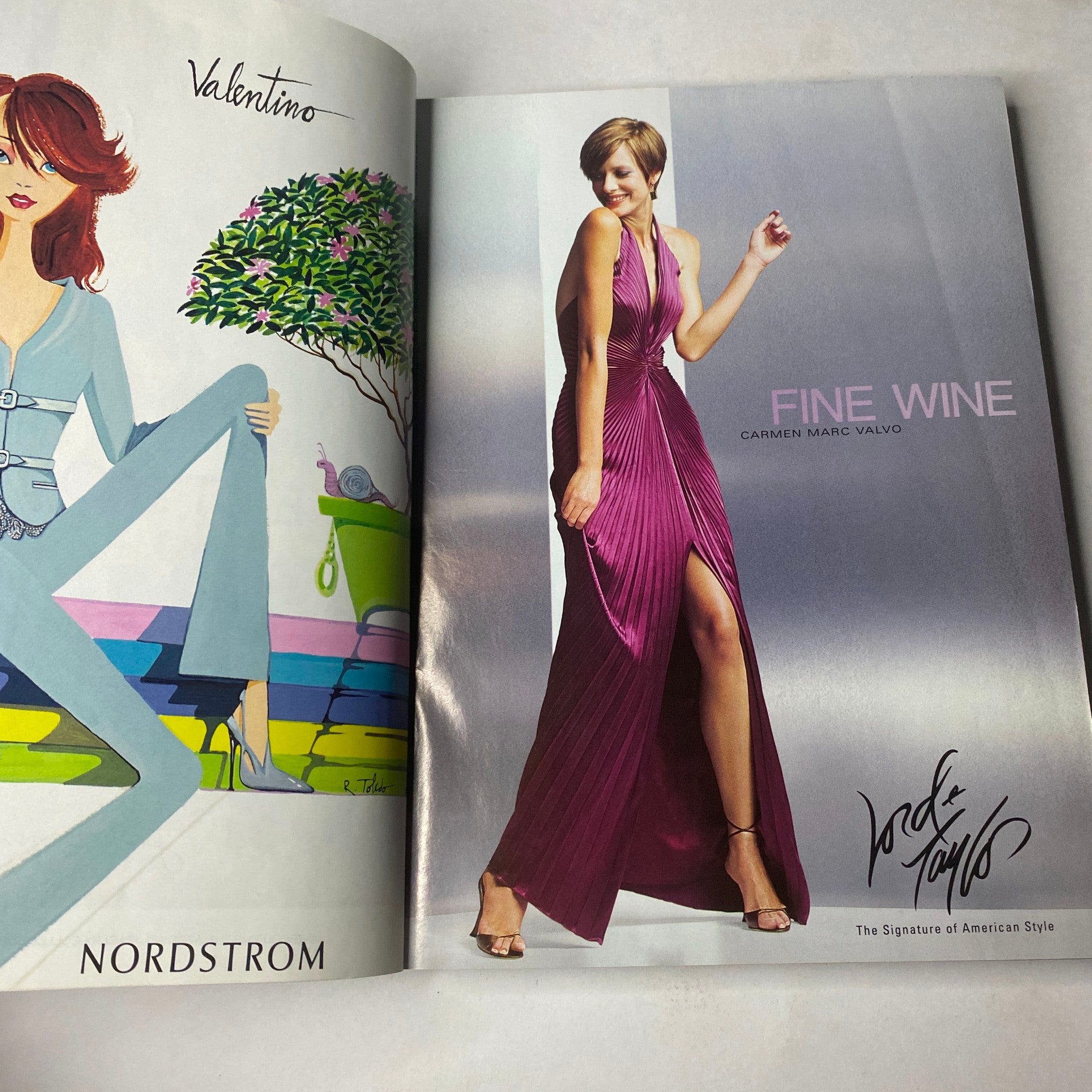 Inside page of Vogue Magazine November 2003 featuring a fashion advertisement for Carmen Marc Valvo's dress titled 'Fine Wine', promoting elegance and high-fashion style.