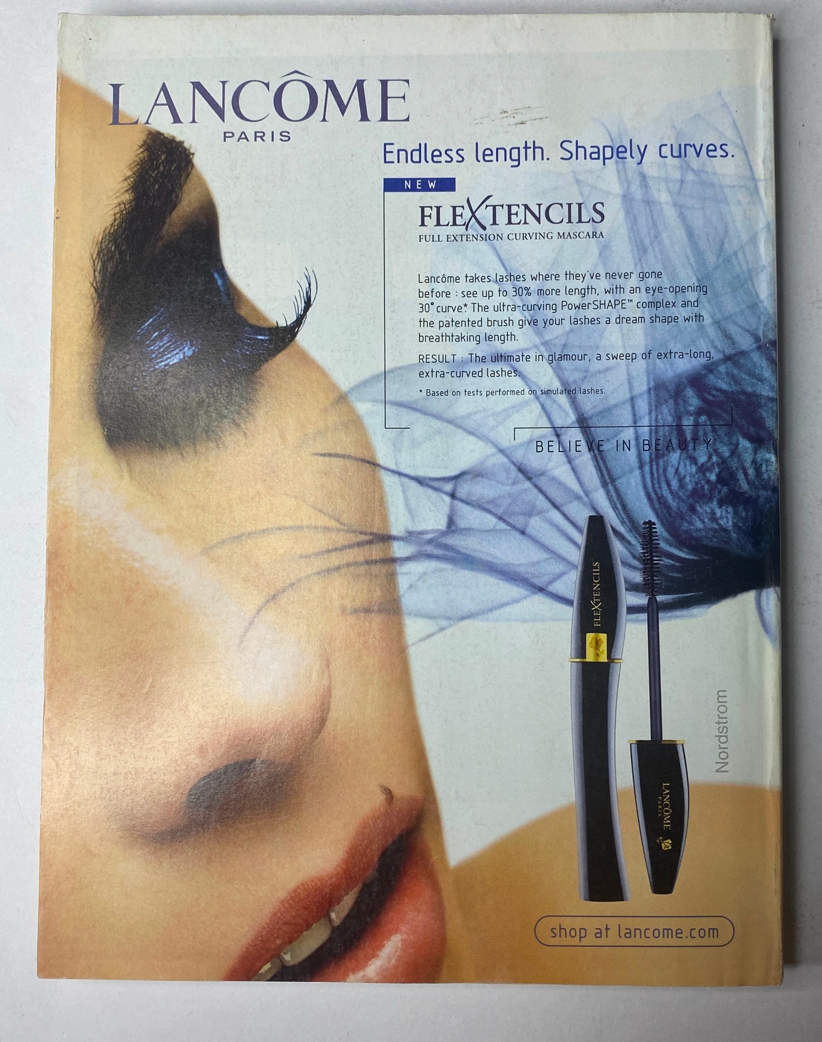 Vogue Magazine October 2003 Gwyneth Paltrow Cover No Label advertisement for Lancôme Paris' new FLEXTENCILS mascara, highlighting beauty through bold eye makeup.