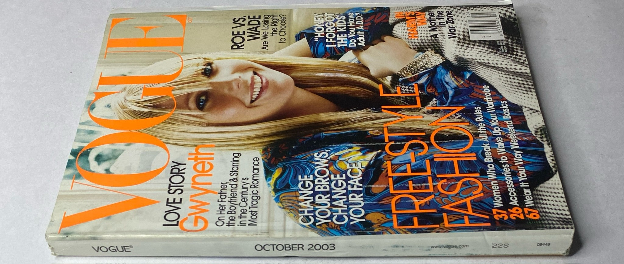 Vogue Magazine October 2003 Gwyneth Paltrow Cover No Label showcasing the magazine's cover with Gwyneth Paltrow, featuring colorful text highlighting articles and themes of the issue.