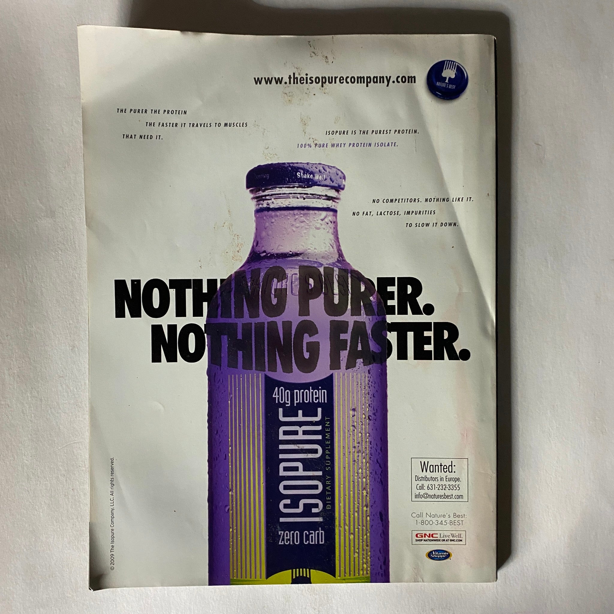 Back cover of Muscle & Fitness Magazine, October 2010, showcasing an advertisement for Isopure Zero Carb protein, emphasizing nutrition for fitness enthusiasts.